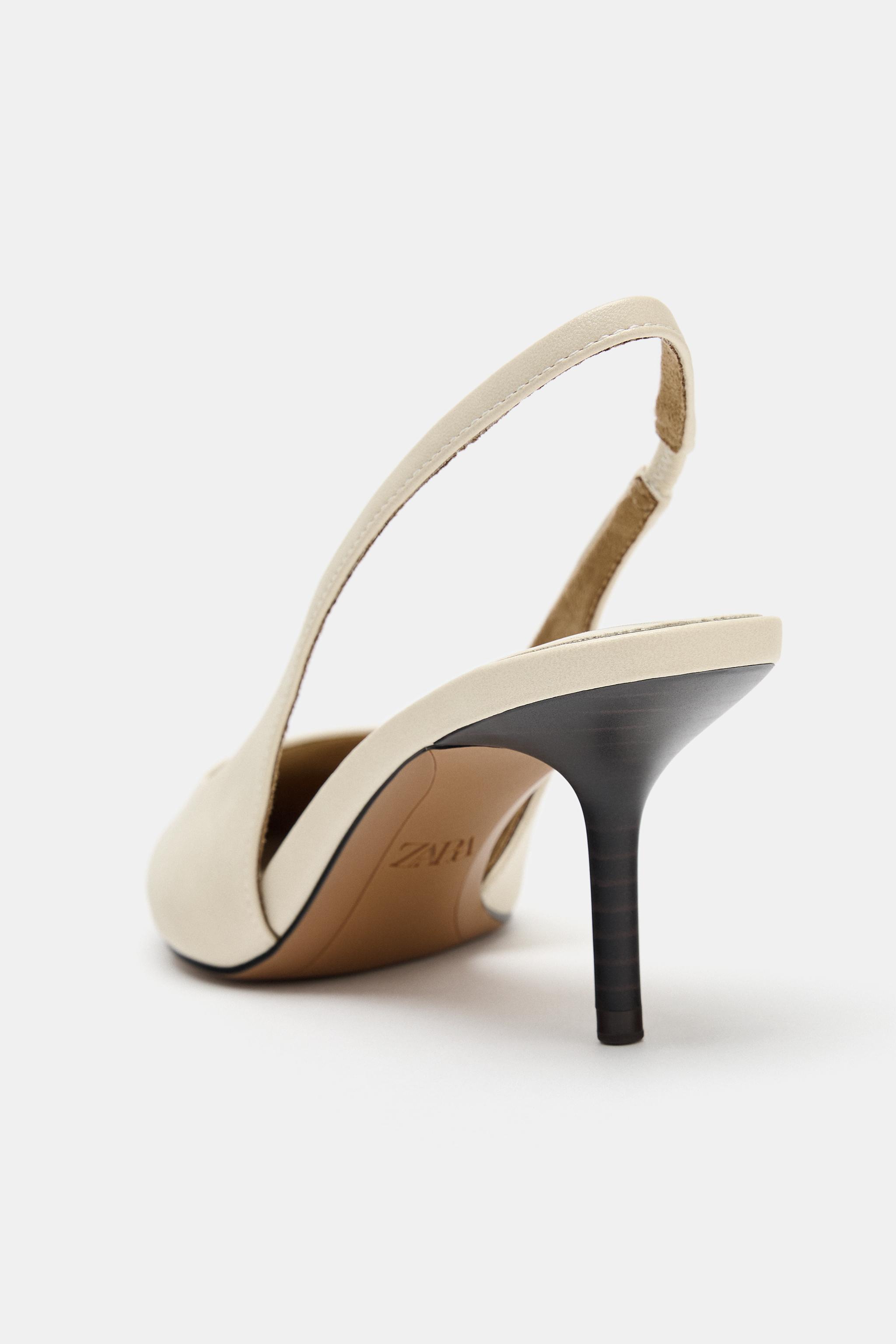 CHAUSSURES À TALONS OUVERTES L'ARRIÈRE
