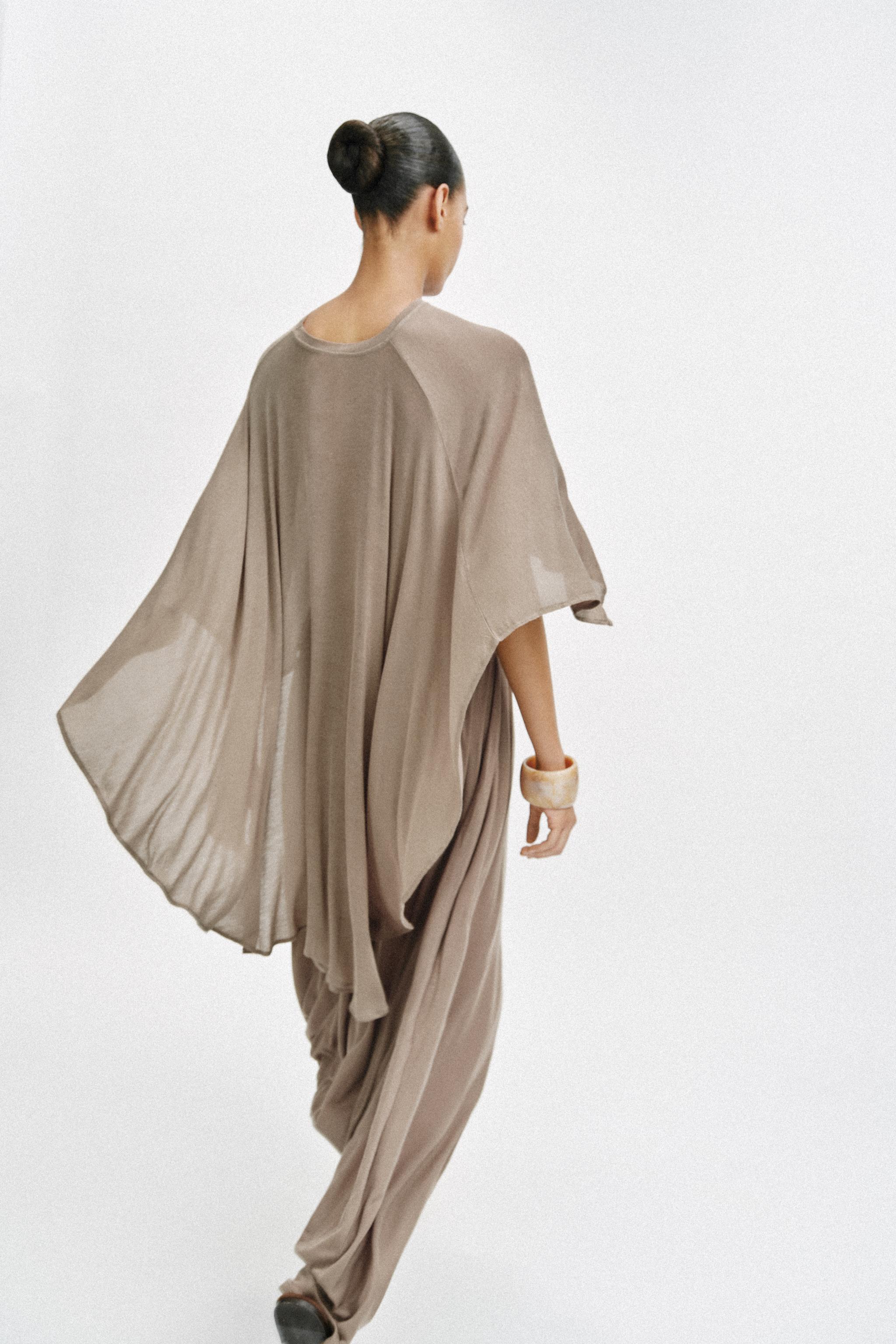 ASYMMETRIC CAPE TOP