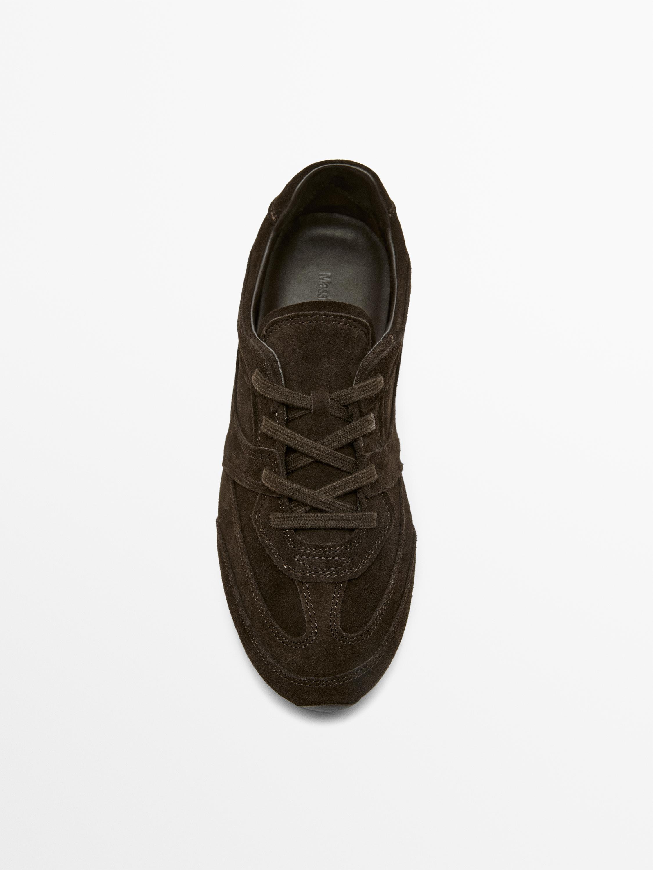 Split leather trainers with piece details