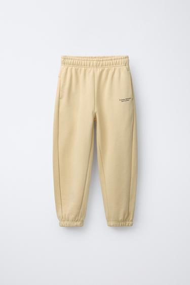 TEXT JOGGERS - Butter by Zara