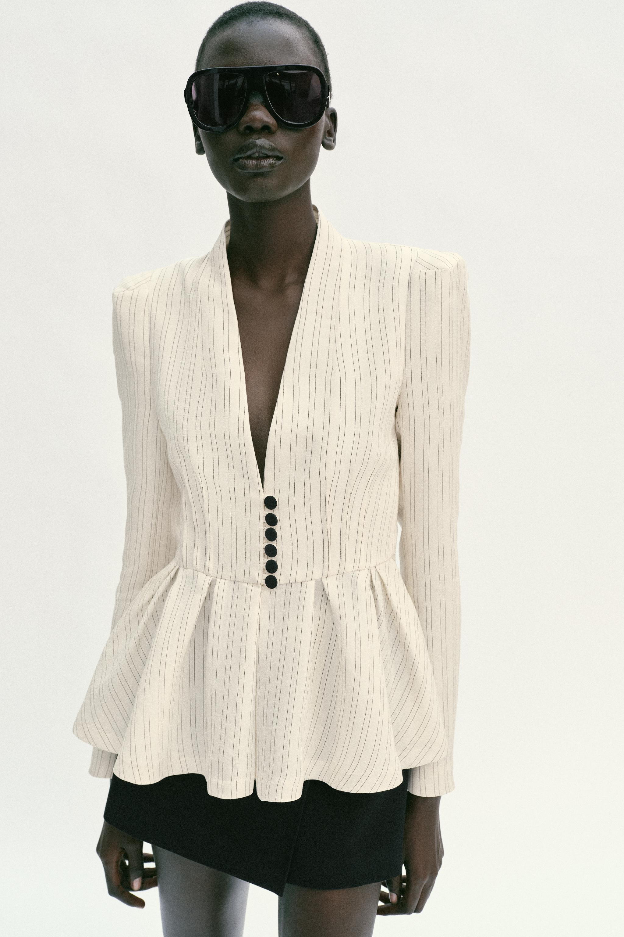VESTE PEPLUM À RAYURES