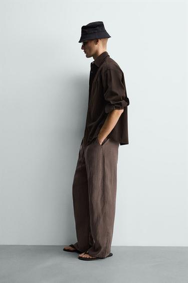 بنطلون RELAXED FIT 100% كتان - بني/ توبو الخاص بـ Zara
