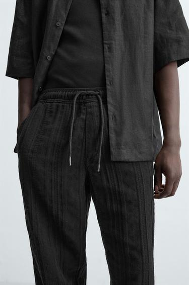 RELAXED FIT TEXTURED TROUSERS - Black by Zara - Image 4