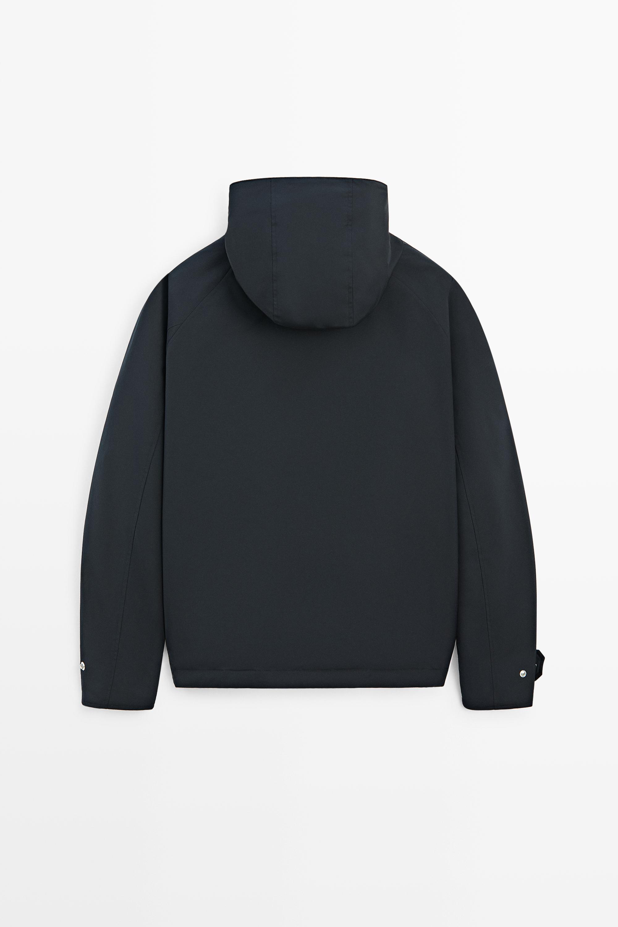 Short quilted parka with pocket details