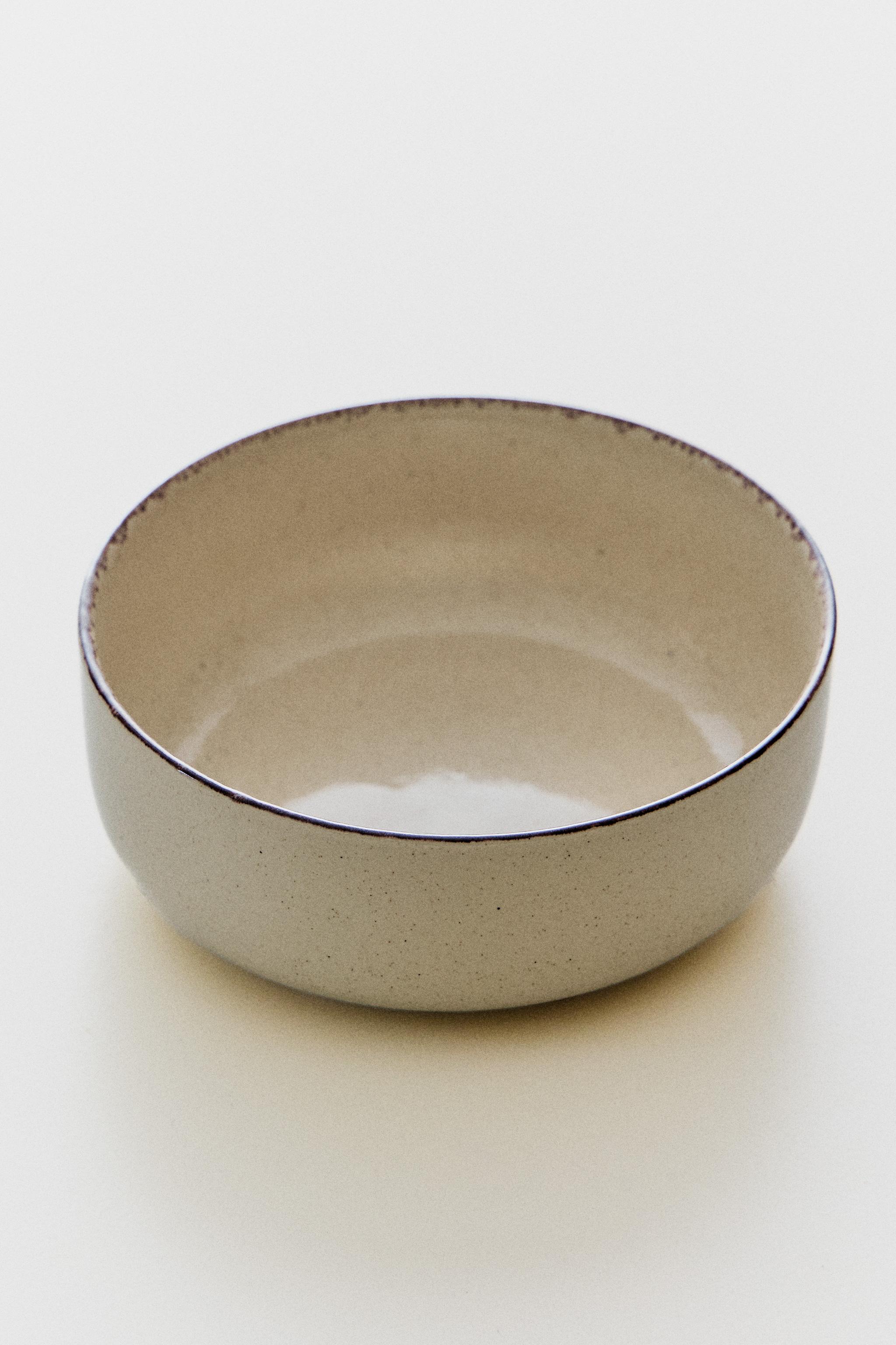 STONEWARE BOWL WITH AGED RIM