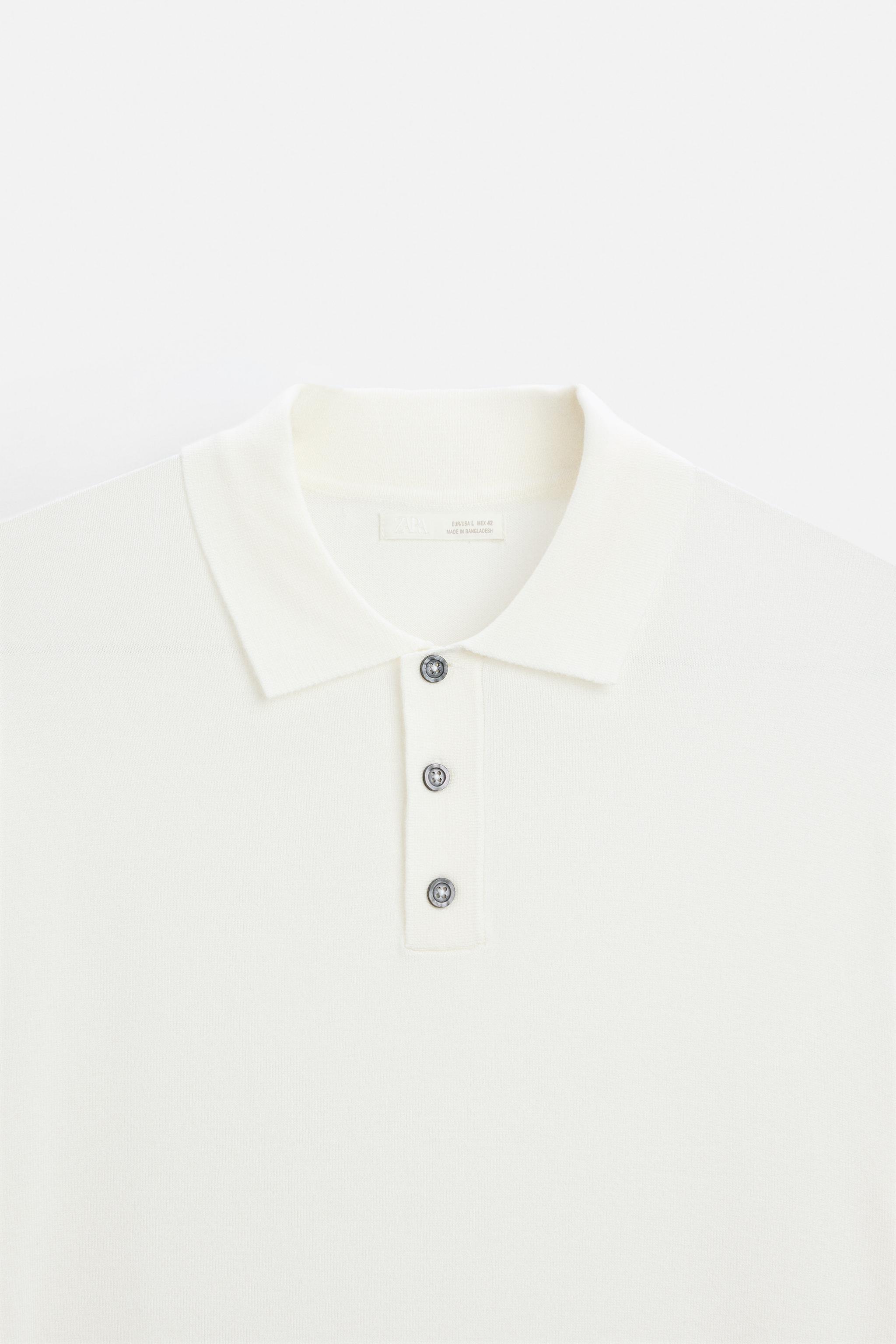 Knit polo shirt in viscose blend fabric. Lapel collar with Knit polo shirt in viscose blend fabric. Lapel collar with