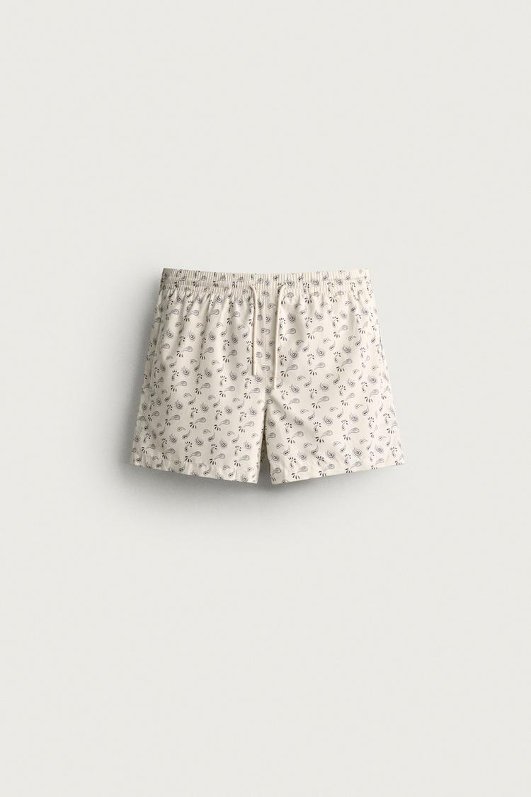 PAISLEY PRINT MID-LENGTH SWIM SHORTS — Ecru