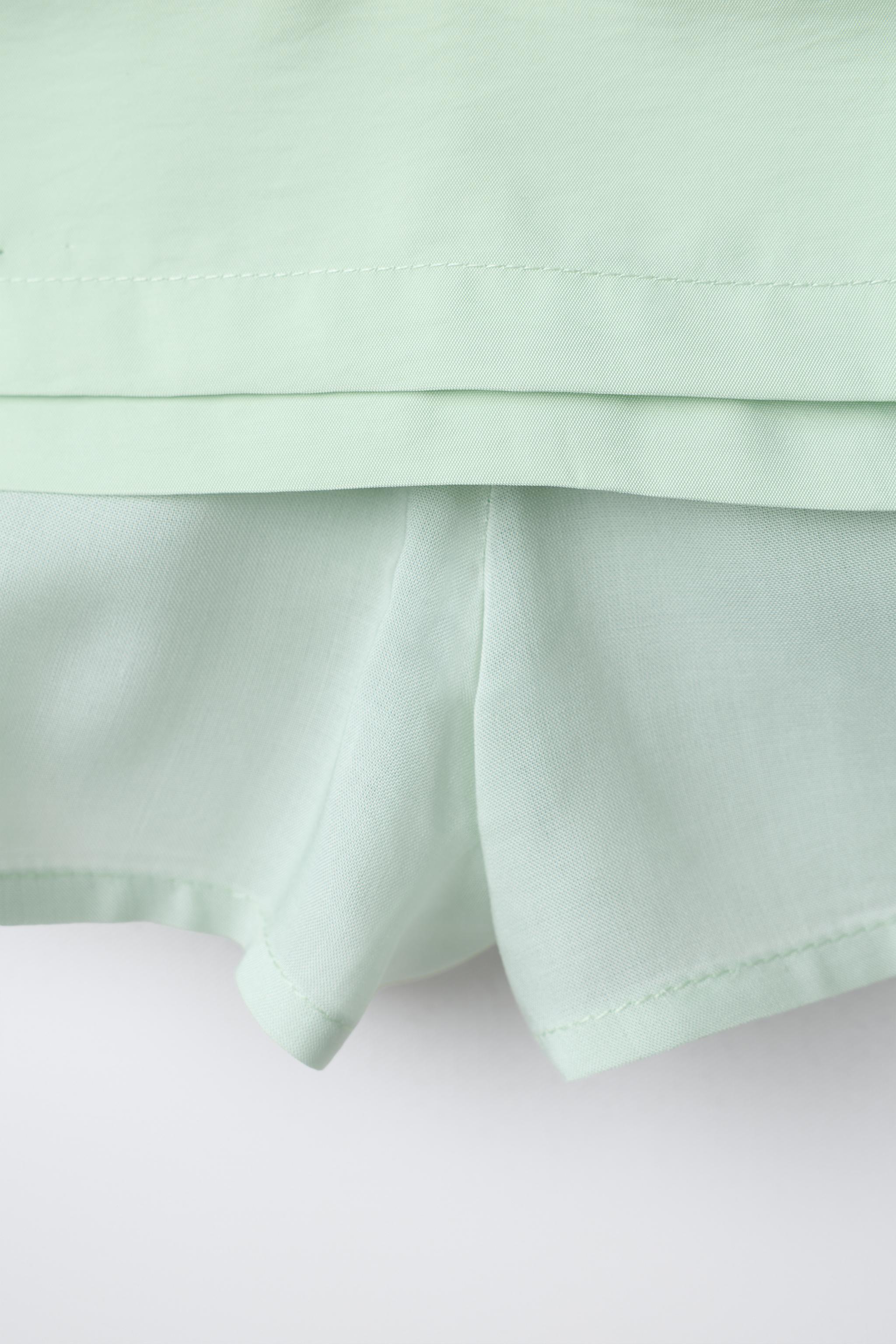 TAFFETA SKIRT WITH WAIST DETAIL
