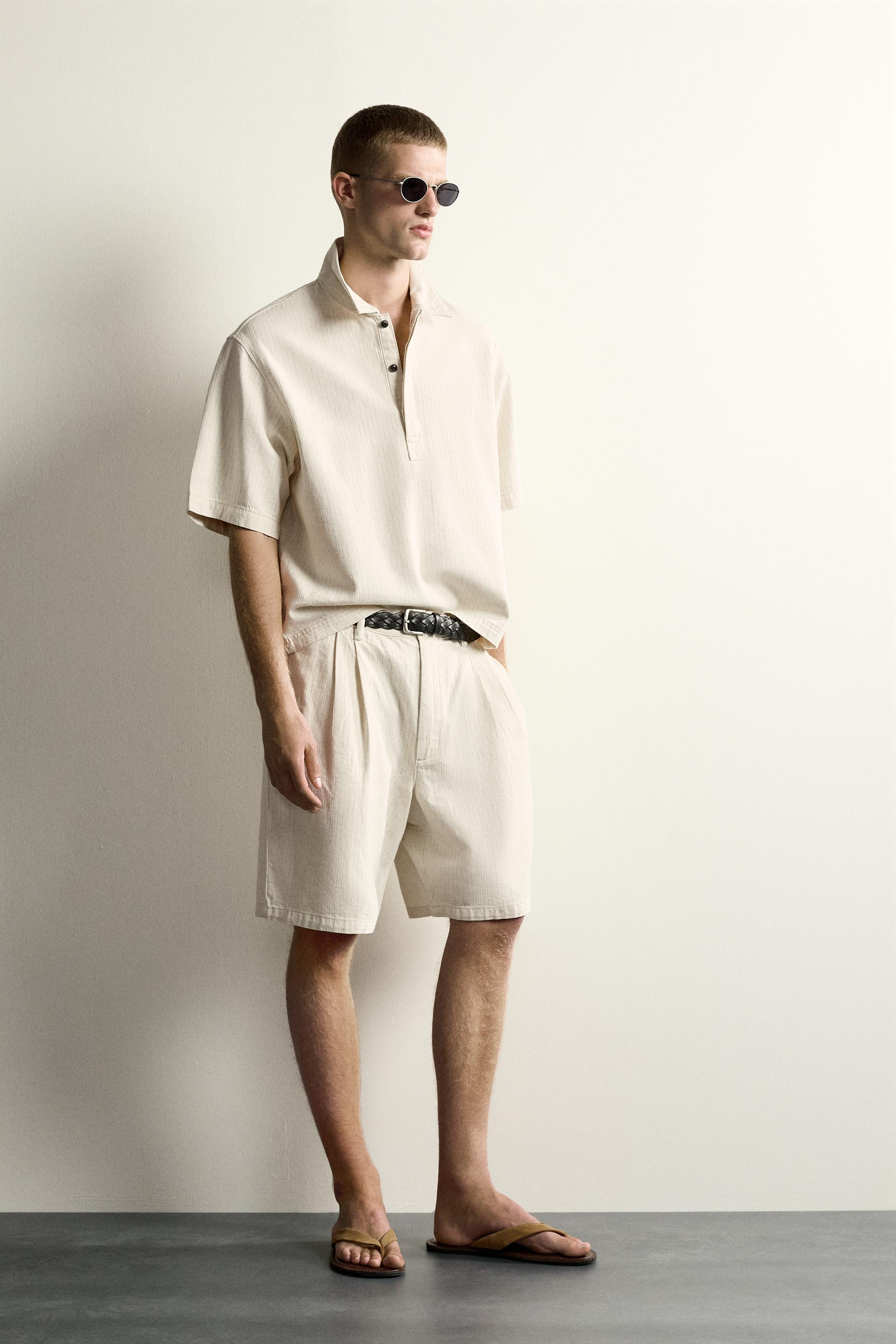 WIDE FIT STRIPED PLEATED SHORTS
