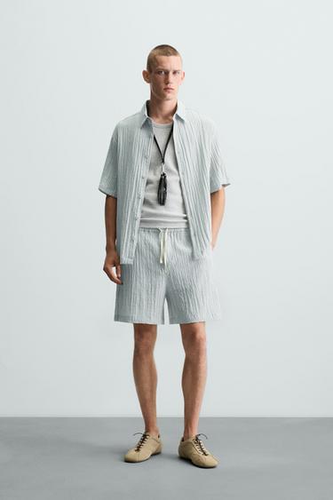 JACQUARD CRINKLE-EFFECT BERMUDA SHORTS - Faded blue by Zara - Image 0