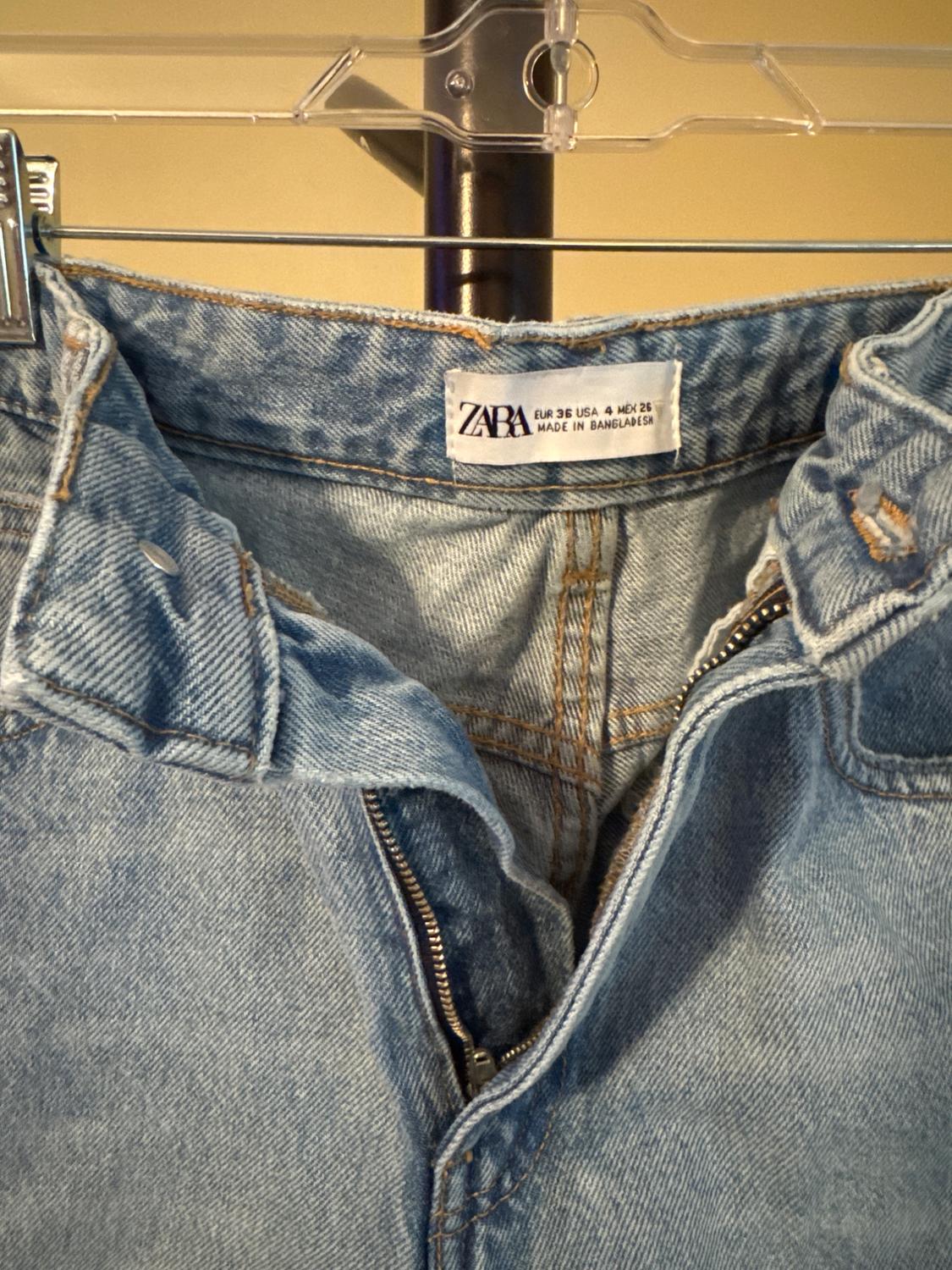 BLUE JEANS WITH RIPS - Image 3