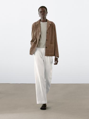 Blazer fluide en cuir finition daim - Noir or de Zara
