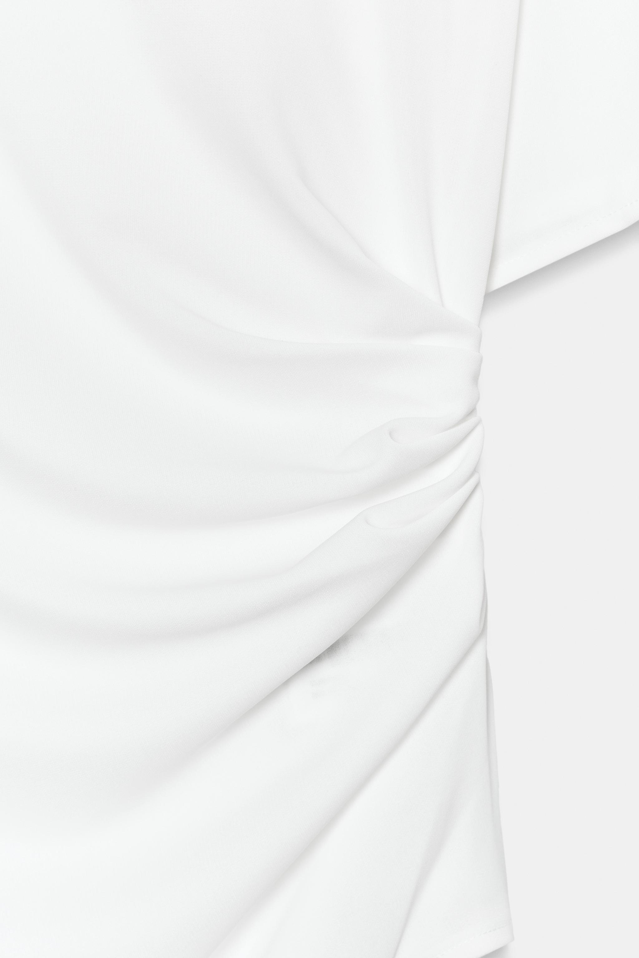 TOP DRAPÉ ASYMÉTRIQUE