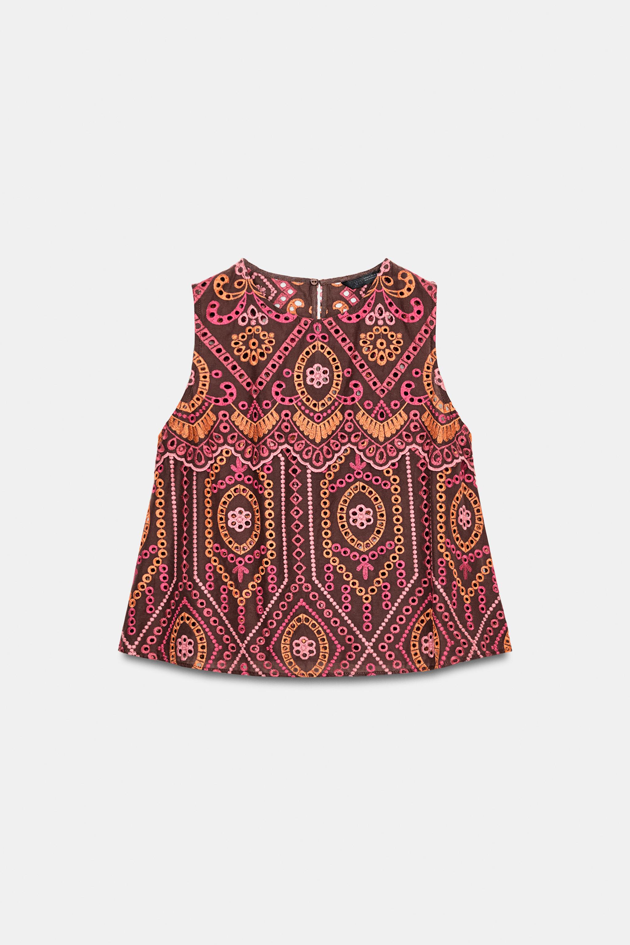 TOP À BRODERIES PERFORÉES