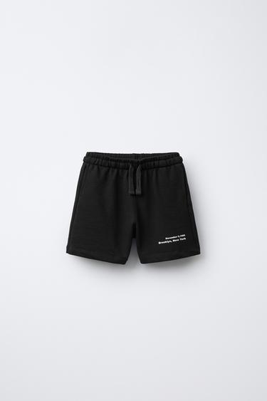 BERMUDA PIQUÉ TEXTO - Negro de Zara
