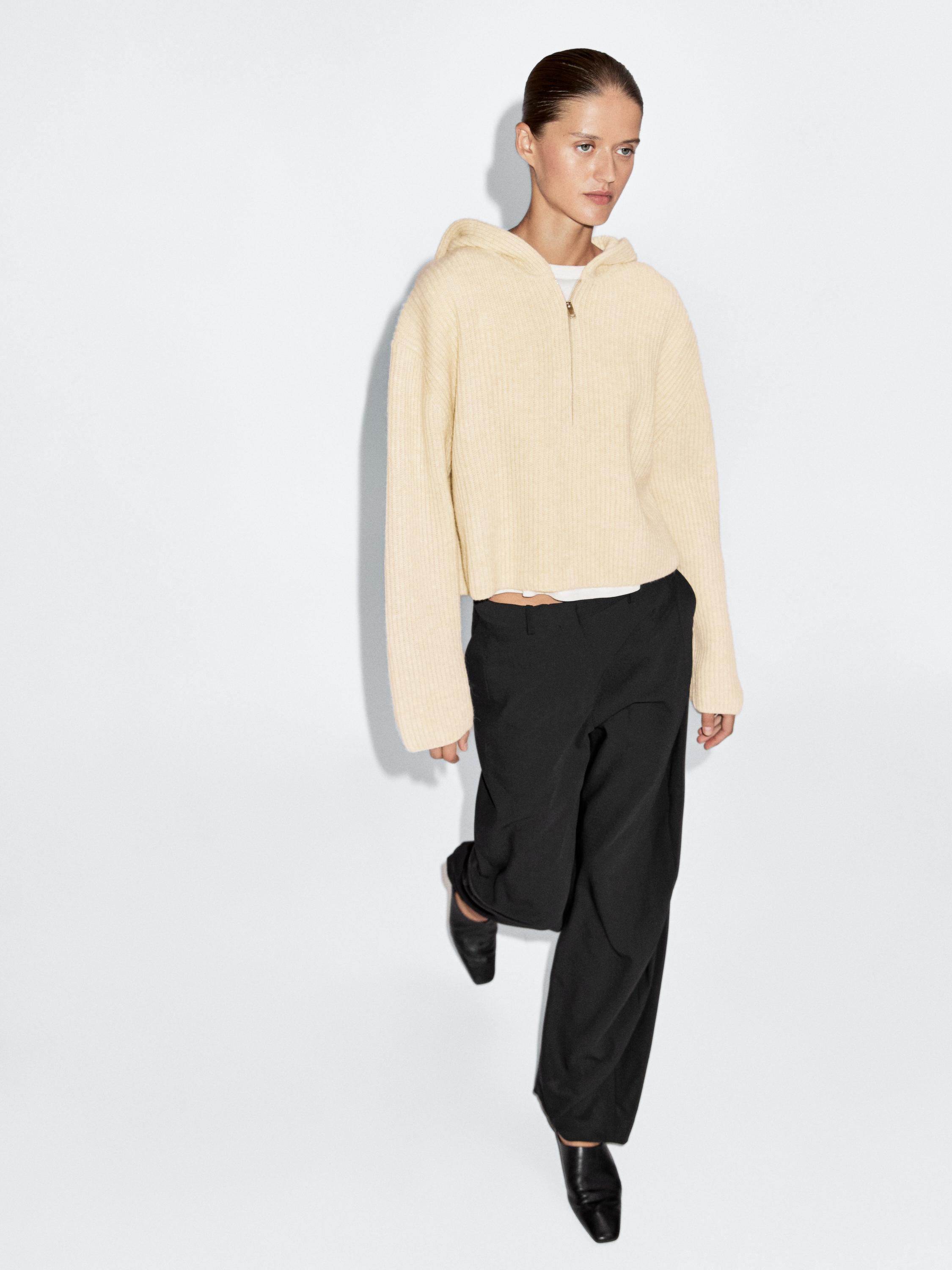 Wool blend sweater with hood detail