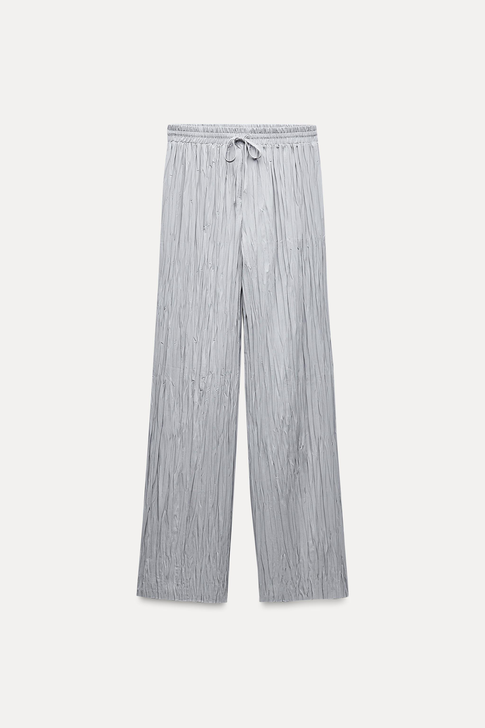 Pantalon plisado zara sale