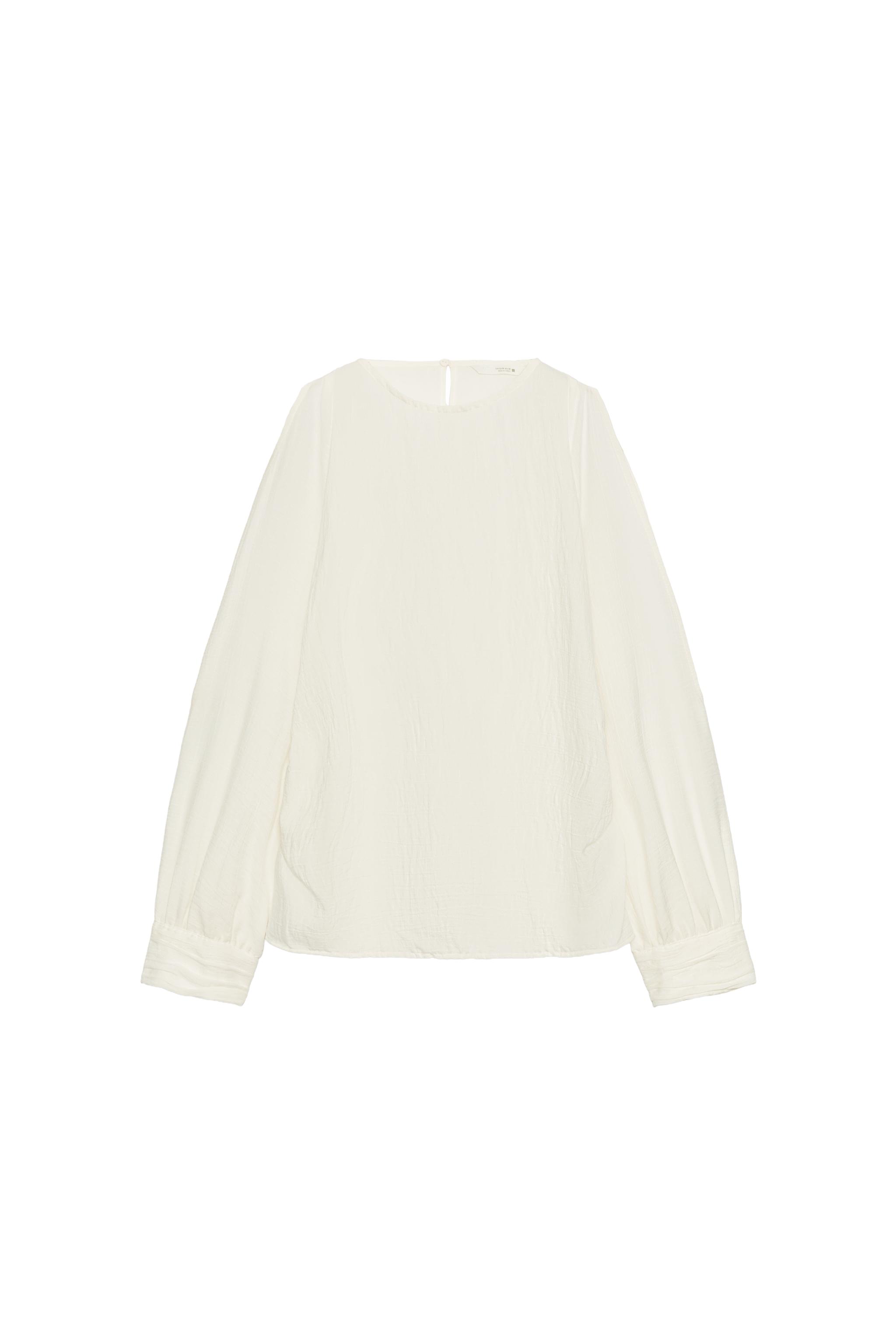 BLUSA ABERTURAS MANGAS