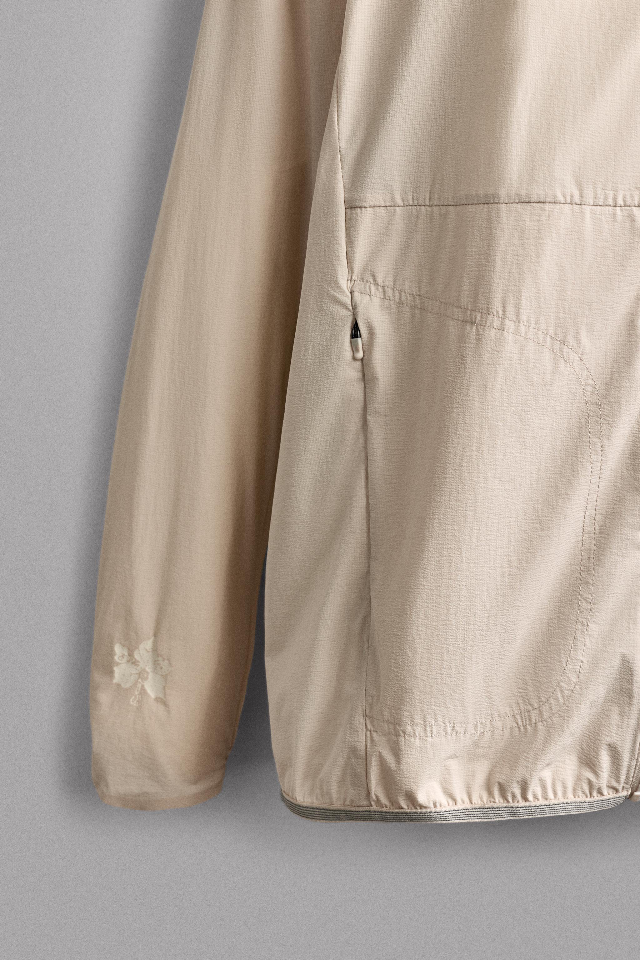 TECHNICAL WINDBREAKER JACKET