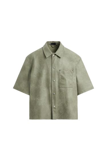 Front view of olive green shirt with buttons and front pocket.