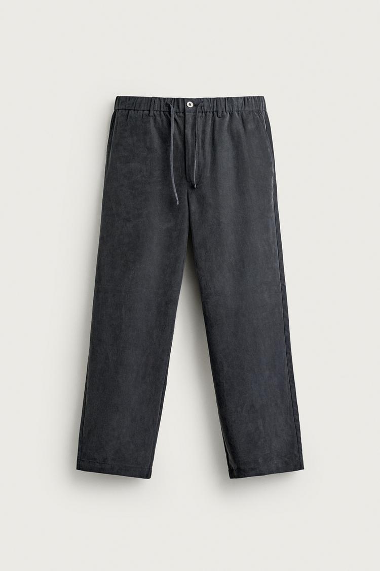RELAXED FIT FLOWING TROUSERS