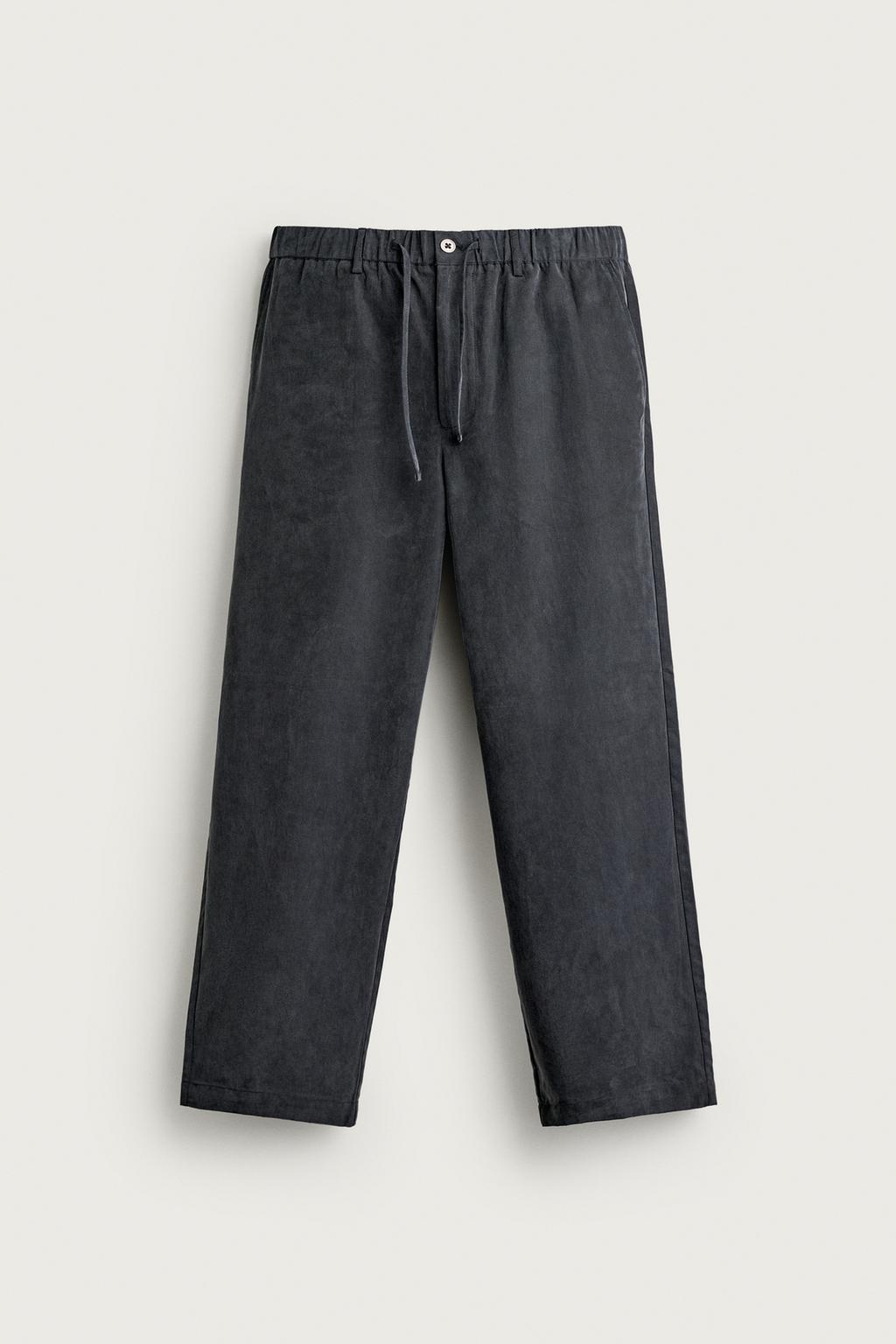 RELAXED FIT FLOWING TROUSERS