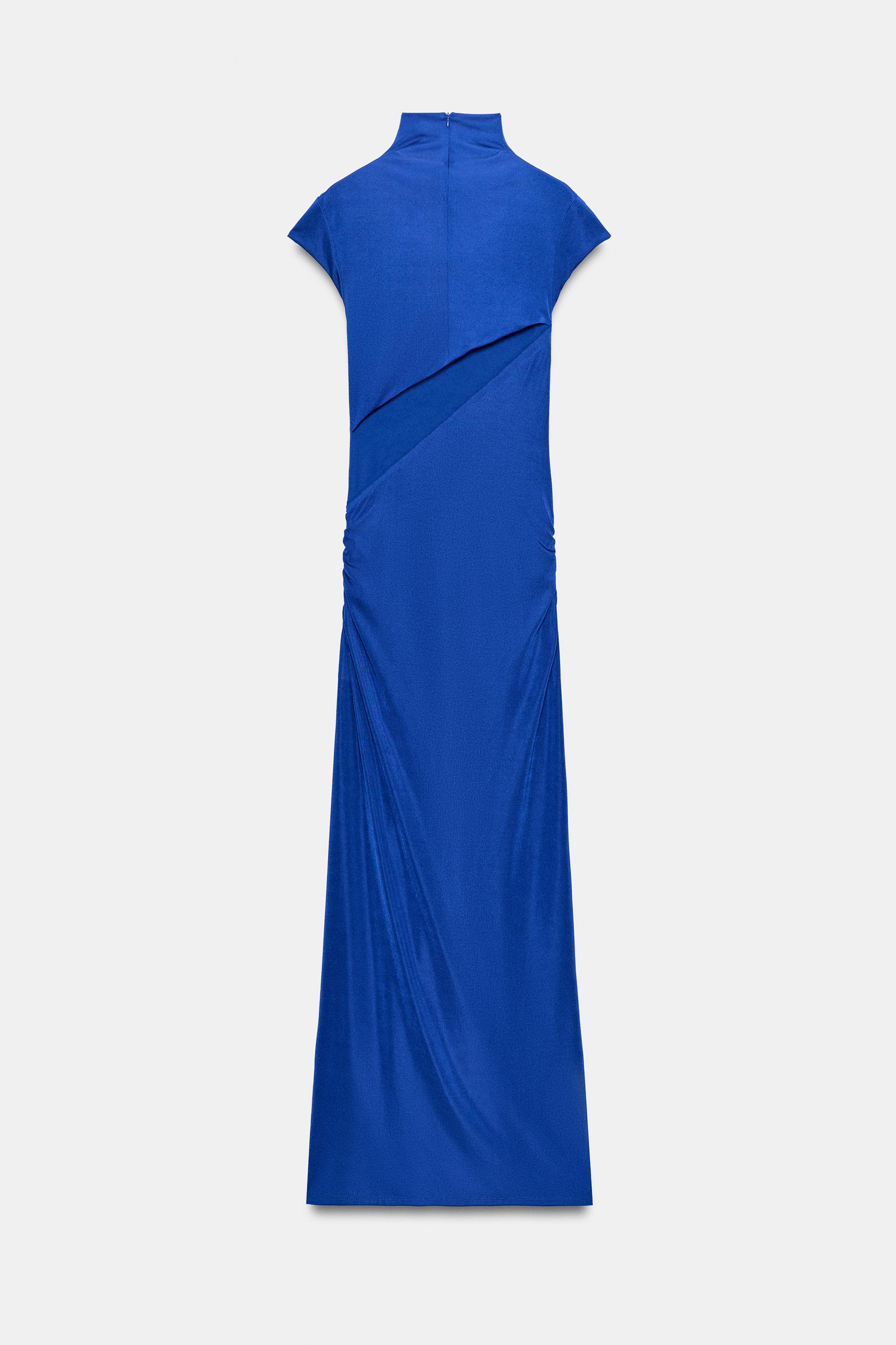 ROBE LONGUE À NŒUD ET OUVERTURE