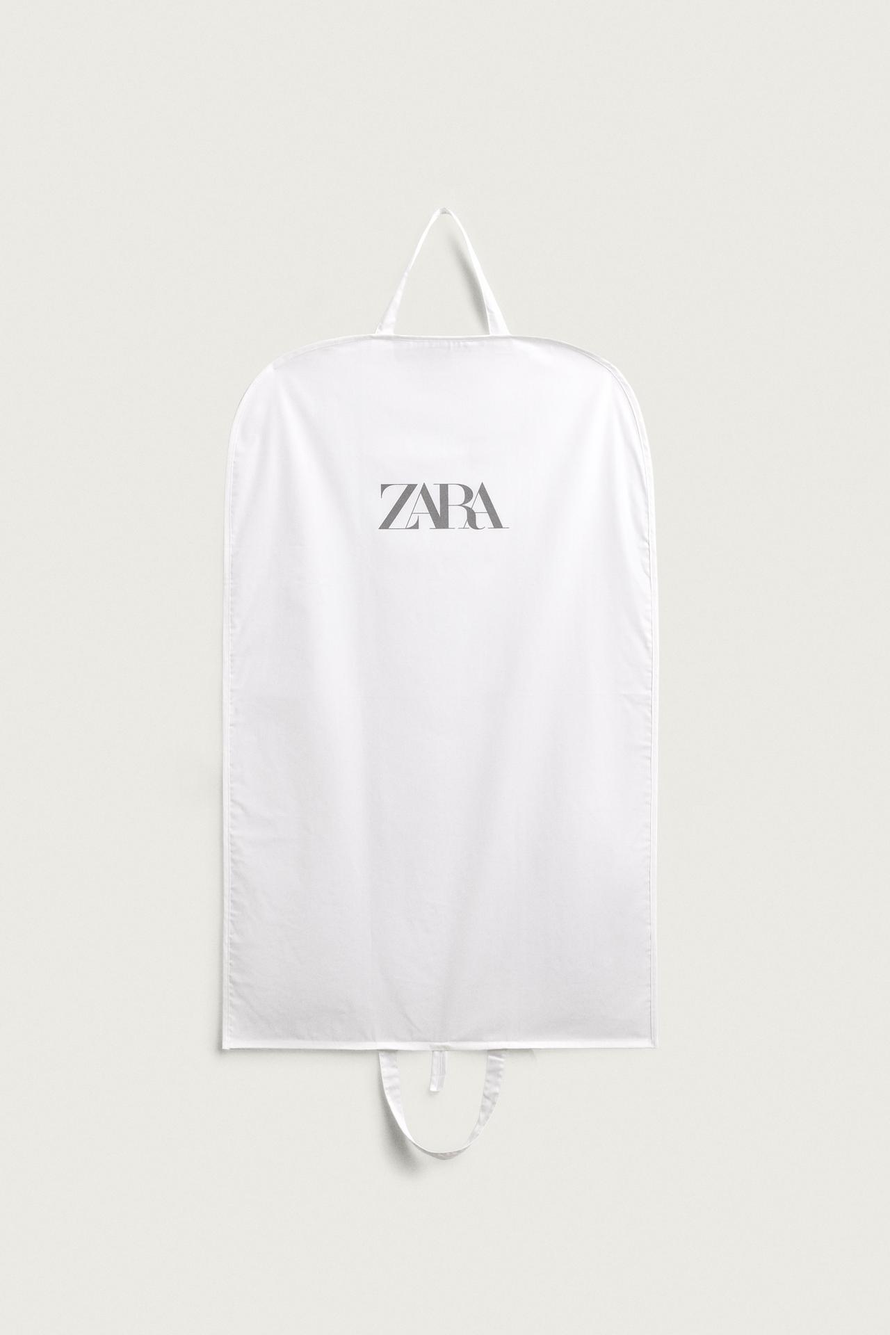 SUIT CARRIER — Ecru