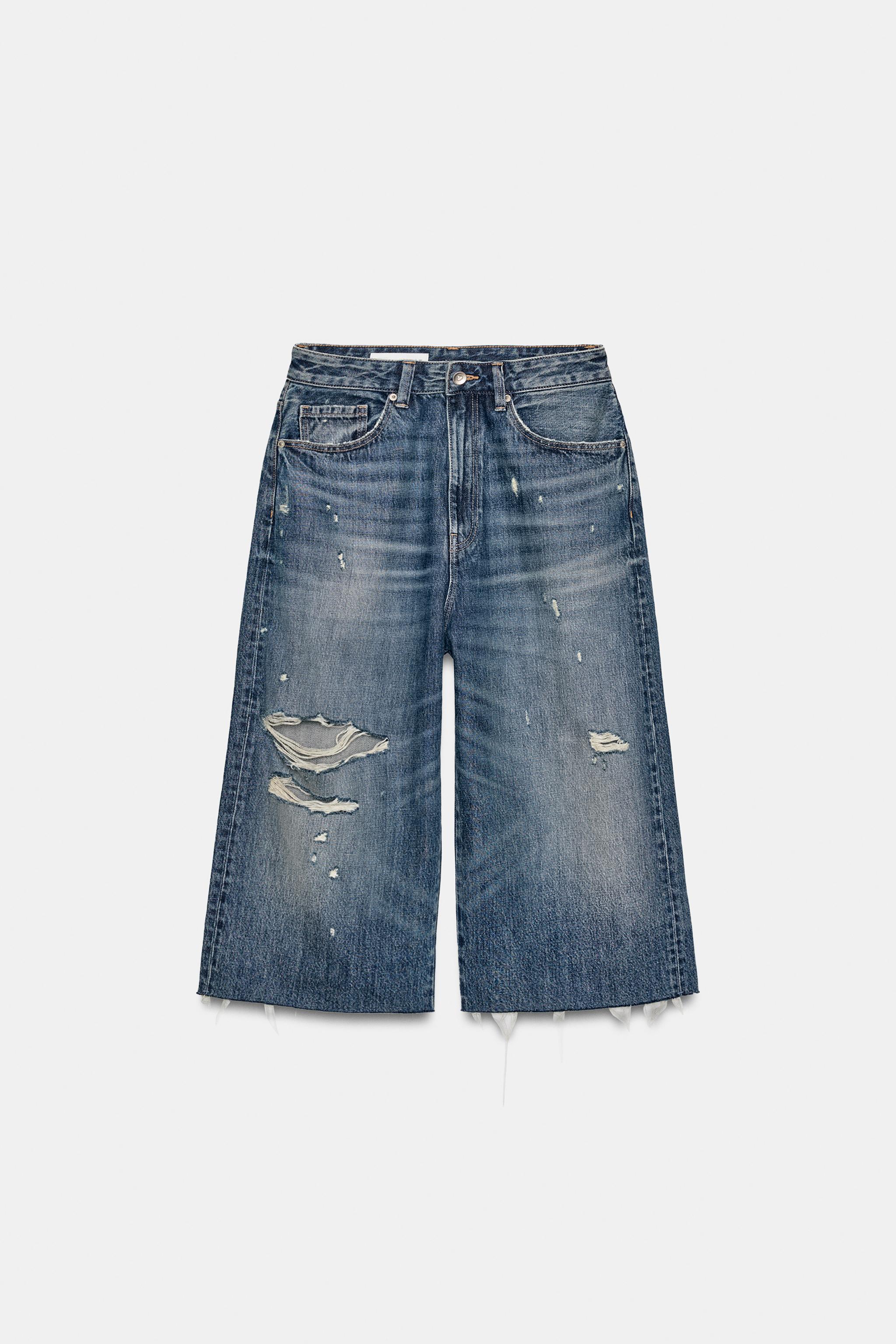 MID-RISE RIPPED DENIM JORTS