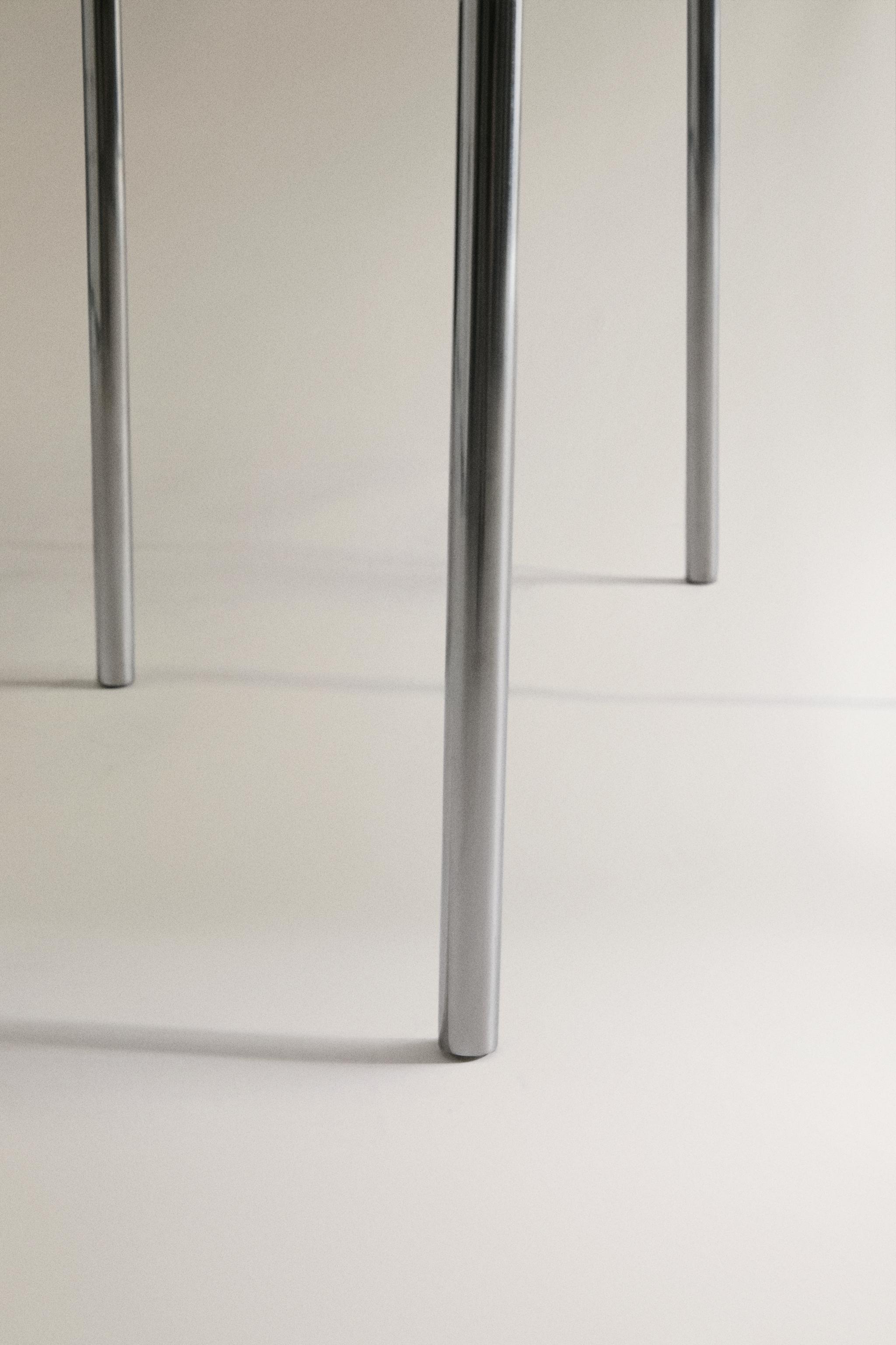CHAISE CUIR ET ACIER INOXYDABLE