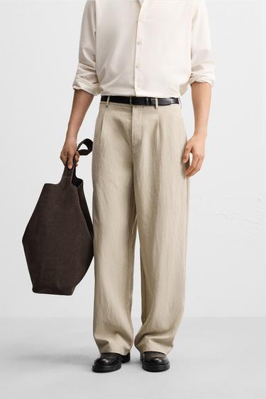 WIDE-FIT PLEATED TROUSERS - Stone by Zara - Image 1