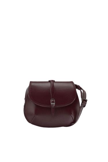 Dark brown leather bag with adjustable strap and buckle fastening, on a white background. Classic and elegant design.