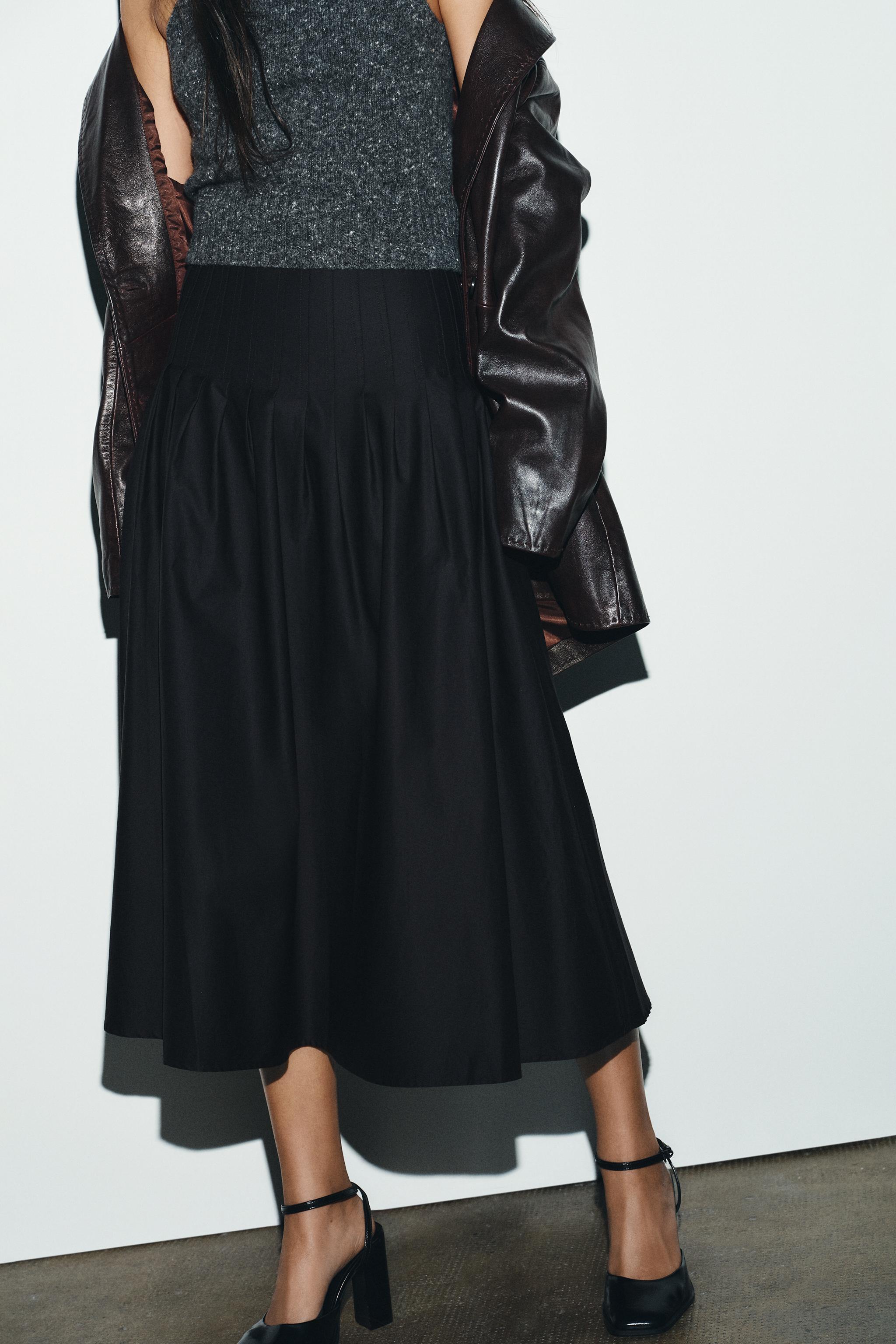 PLEATED MIDI SKIRT