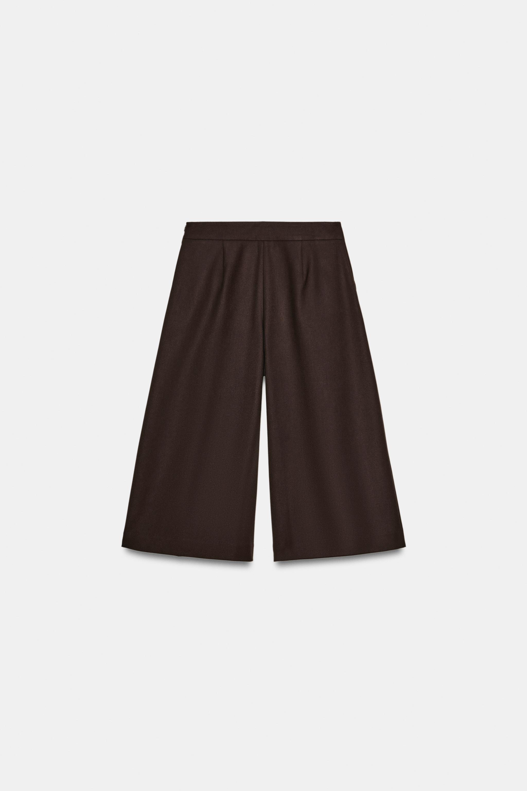 PLEATED LONG BERMUDA SHORTS