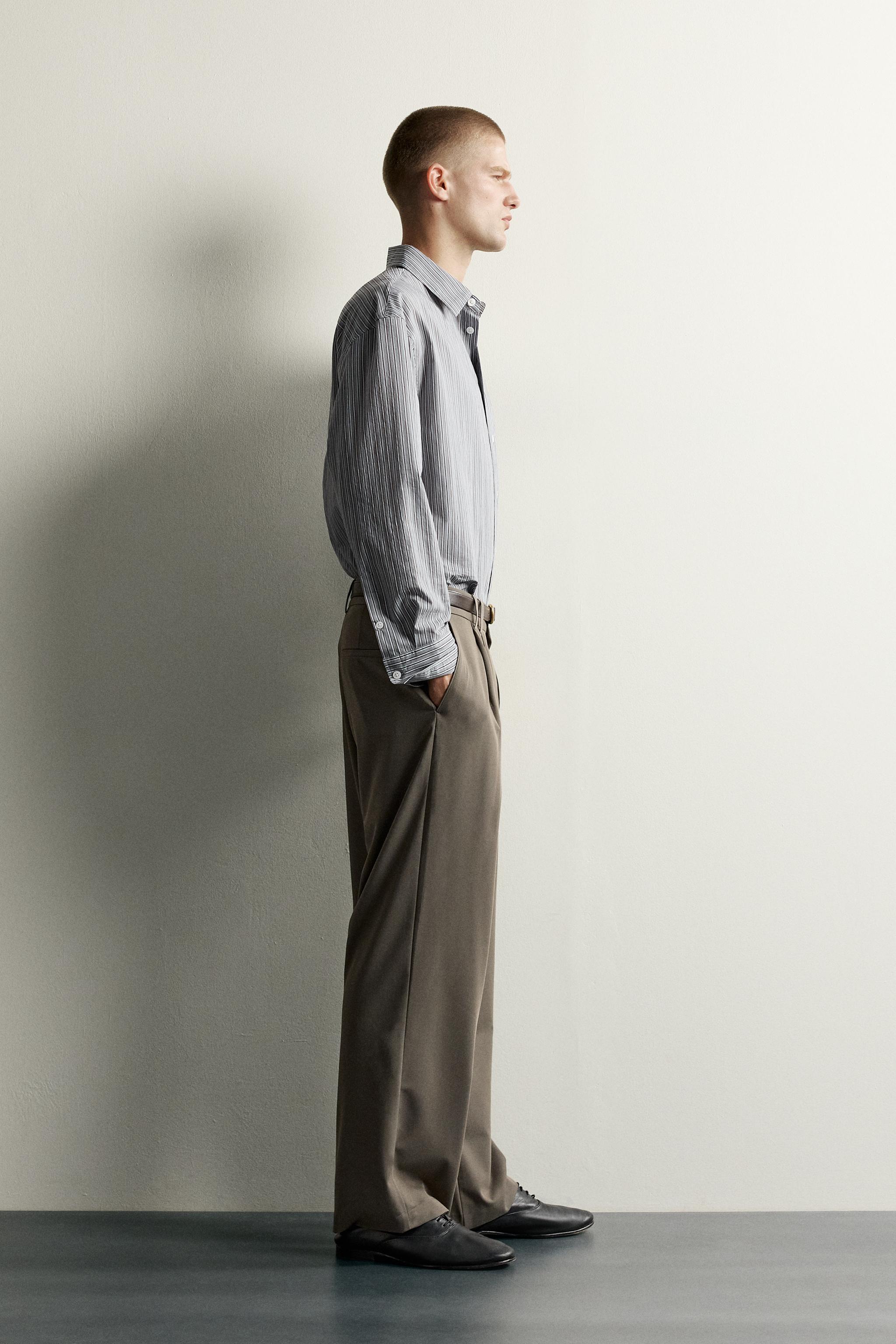 PLEATED WIDE-FIT PANTS