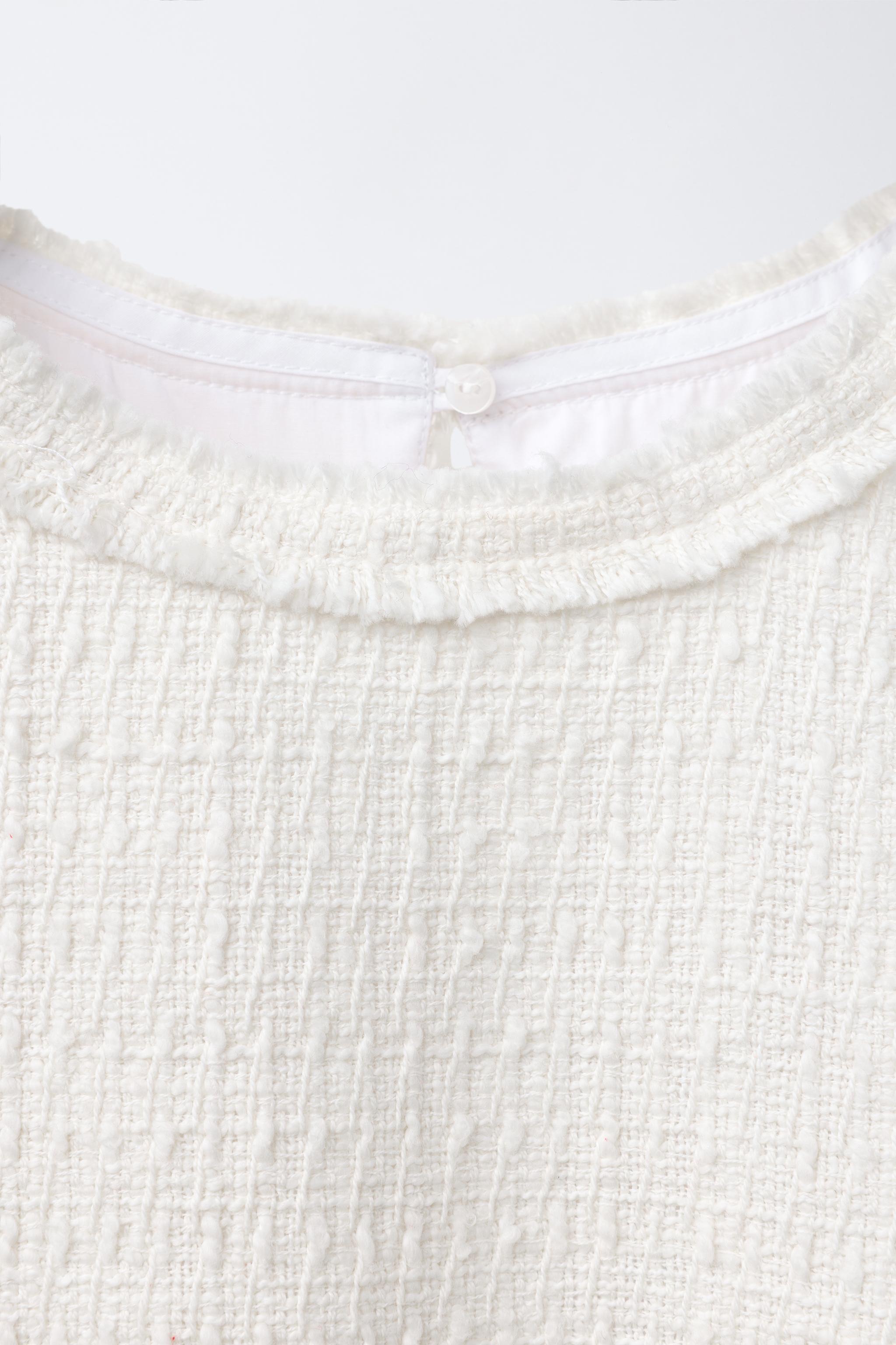 CHEMISE UNIE AVEC CHALECO STRUCTURÉ ET NŒUDS