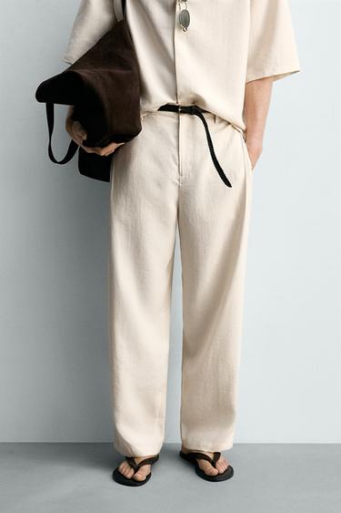 PANTALÓN FLUIDO PLIEGUES - Crudo medio de Zara