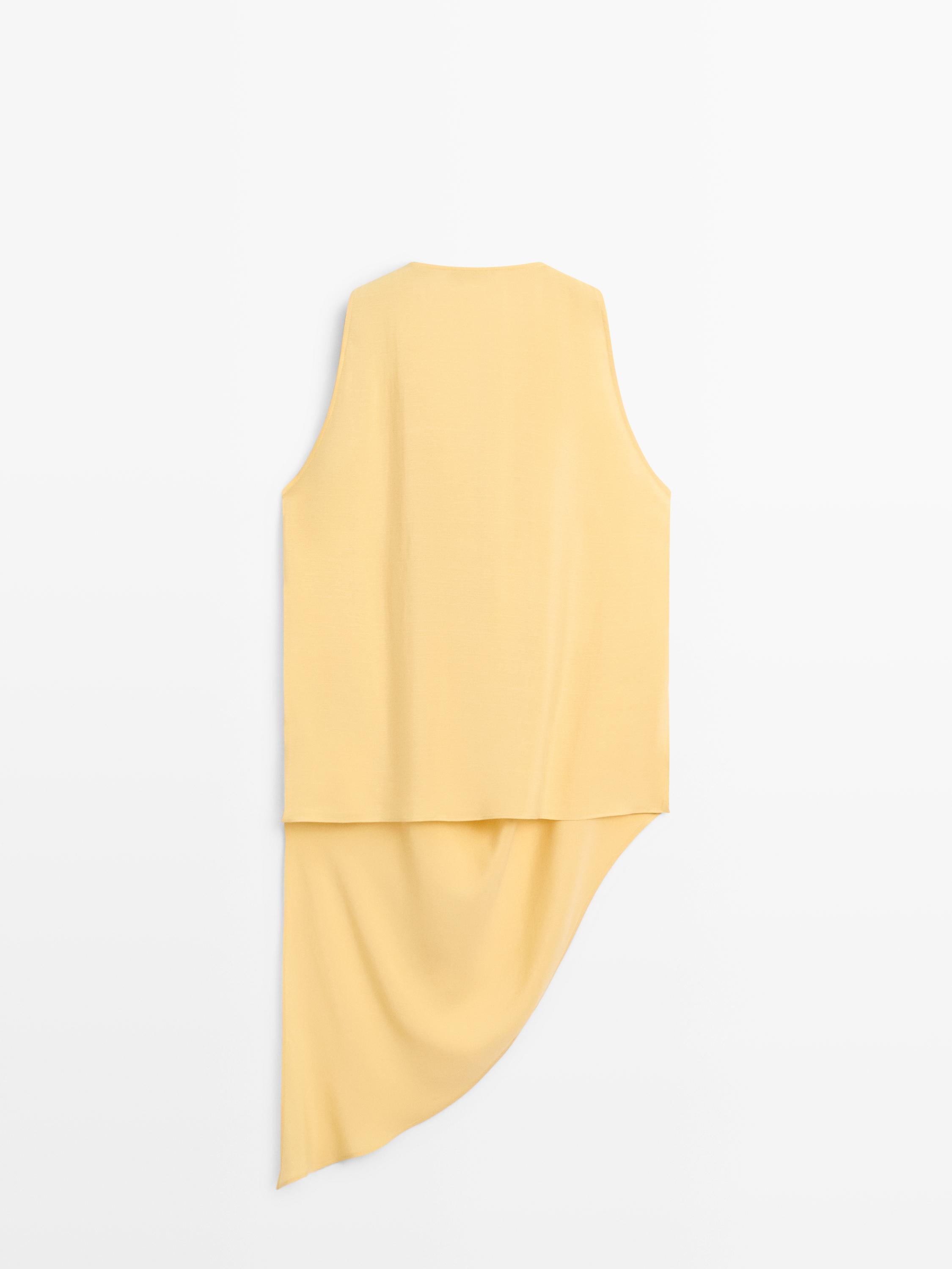 Long flowing asymmetric top