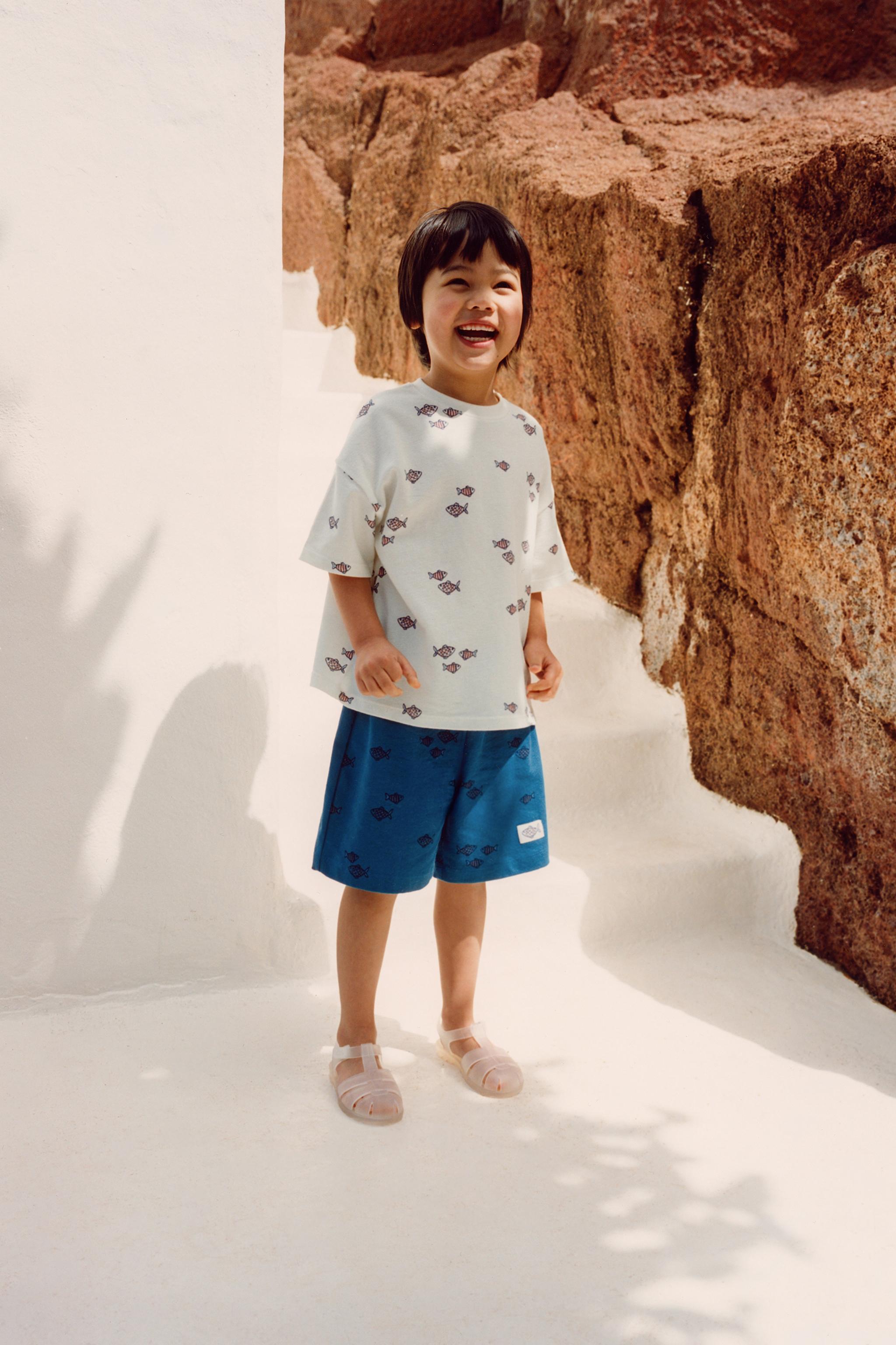 FISH PRINT BERMUDA SHORTS — Blue