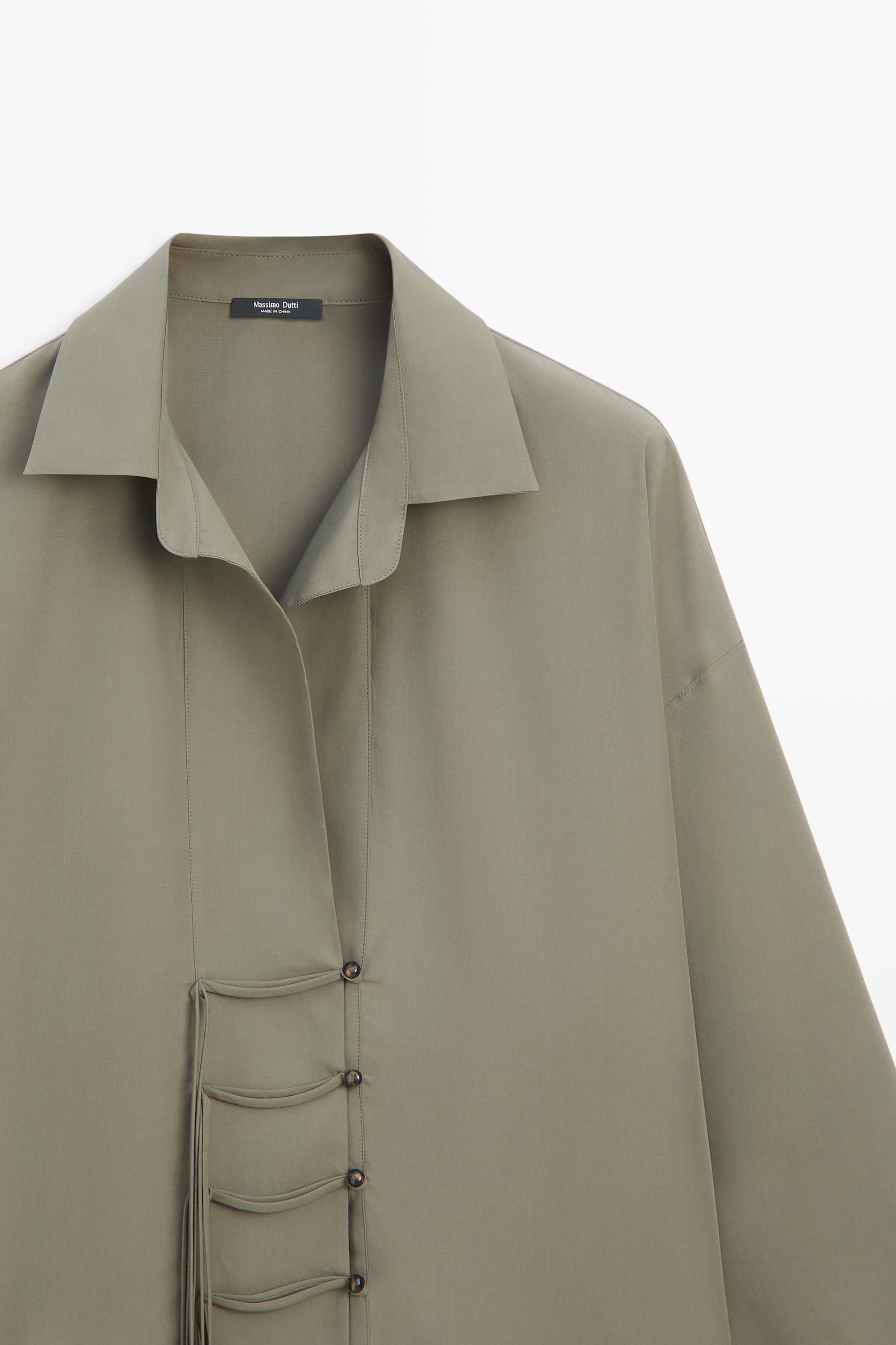 Flowing shirt with button detail