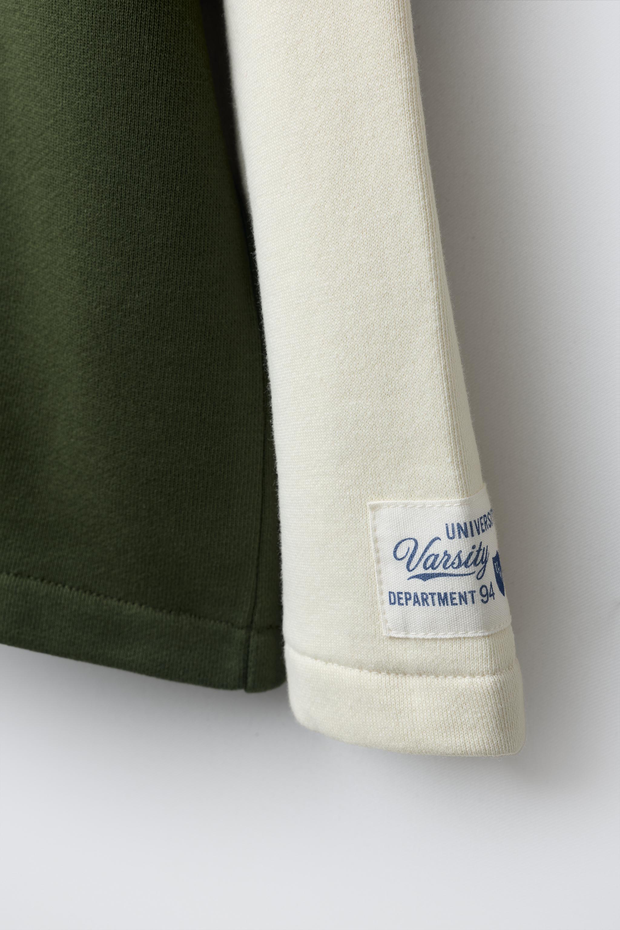 VARSITY NUMBER DOUBLE-SLEEVE SWEATSHIRT