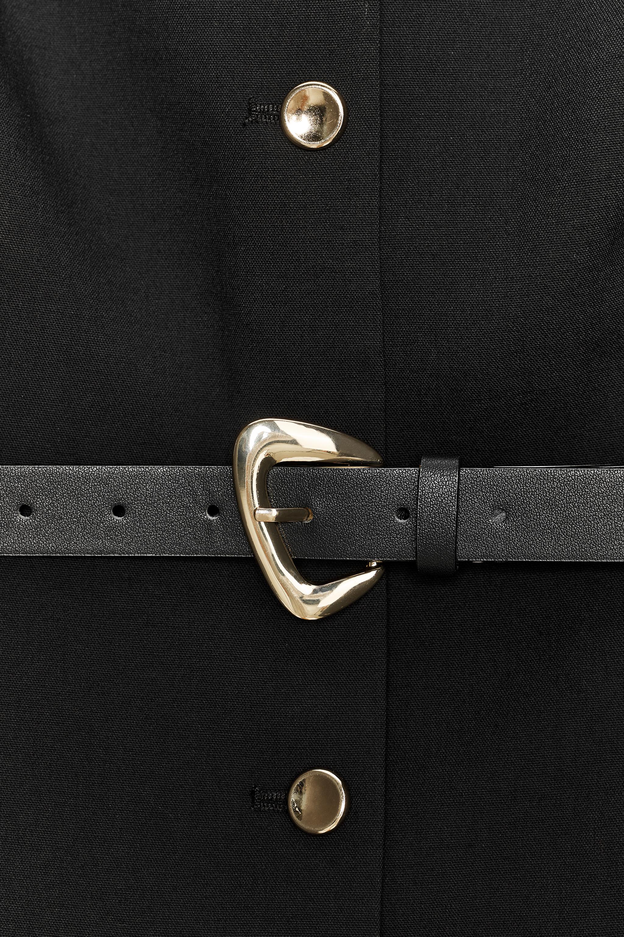 BELTED VEST