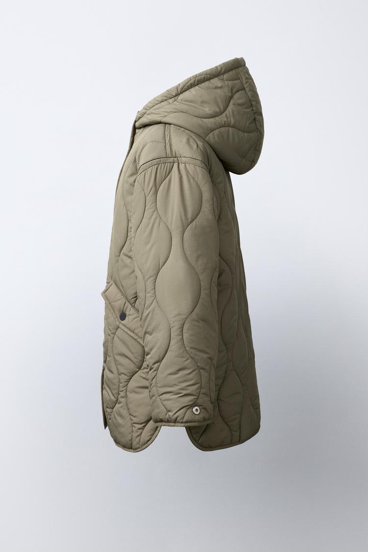 Chaqueta acolchada con capucha repelente al agua 6