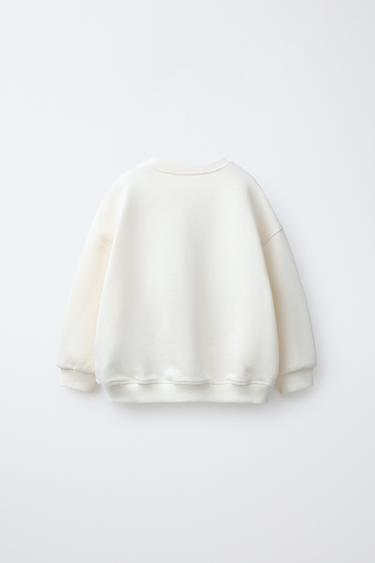 SWEAT À CERISES BRODÉES - Écru de Zara - Image 1