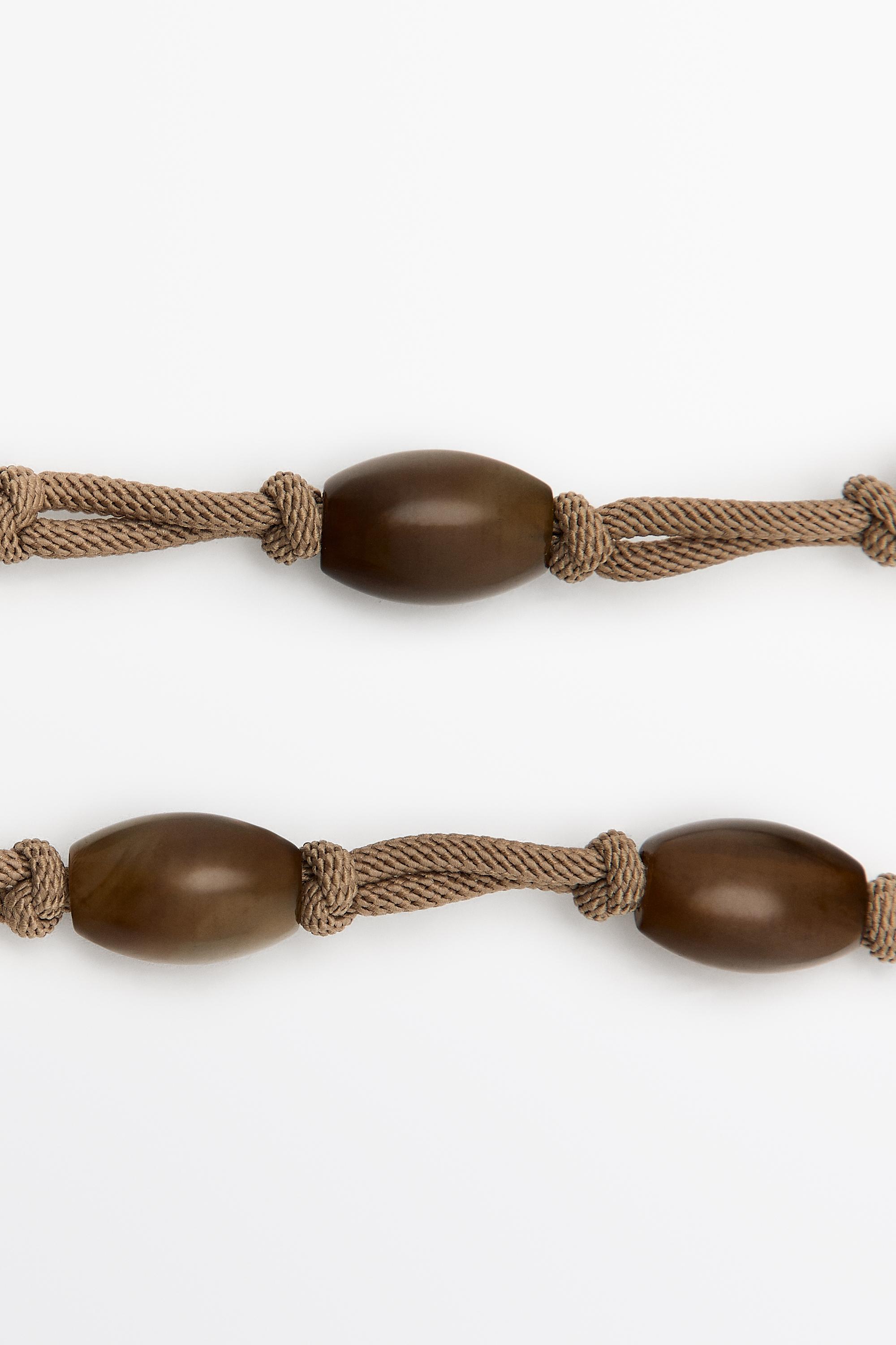 Collier cordon perles gemmes