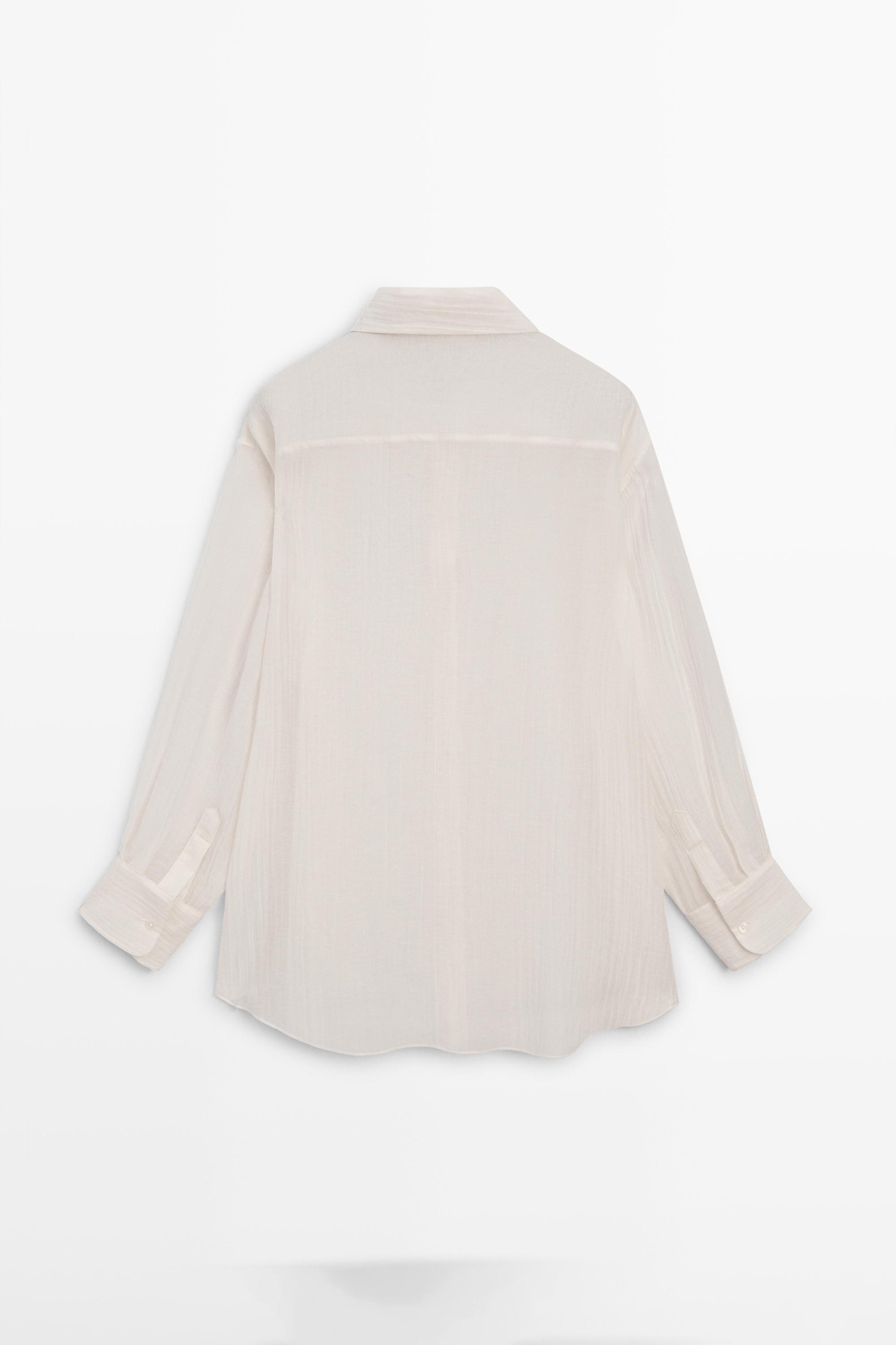 Flowing shirt with pleated detail