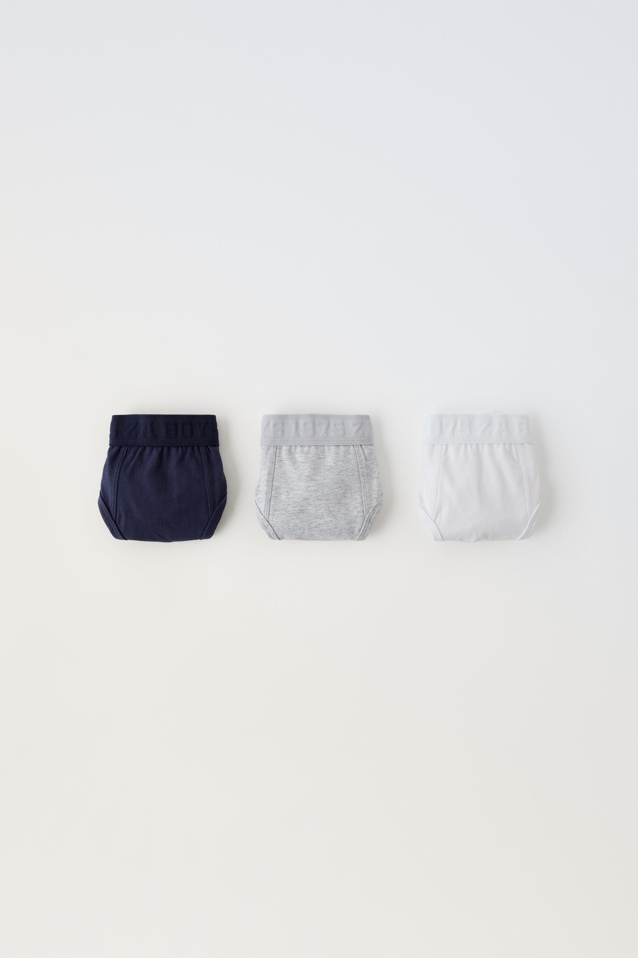 6-14 ANS/ LOT DE TROIS SLIPS AVEC INSCRIPTION