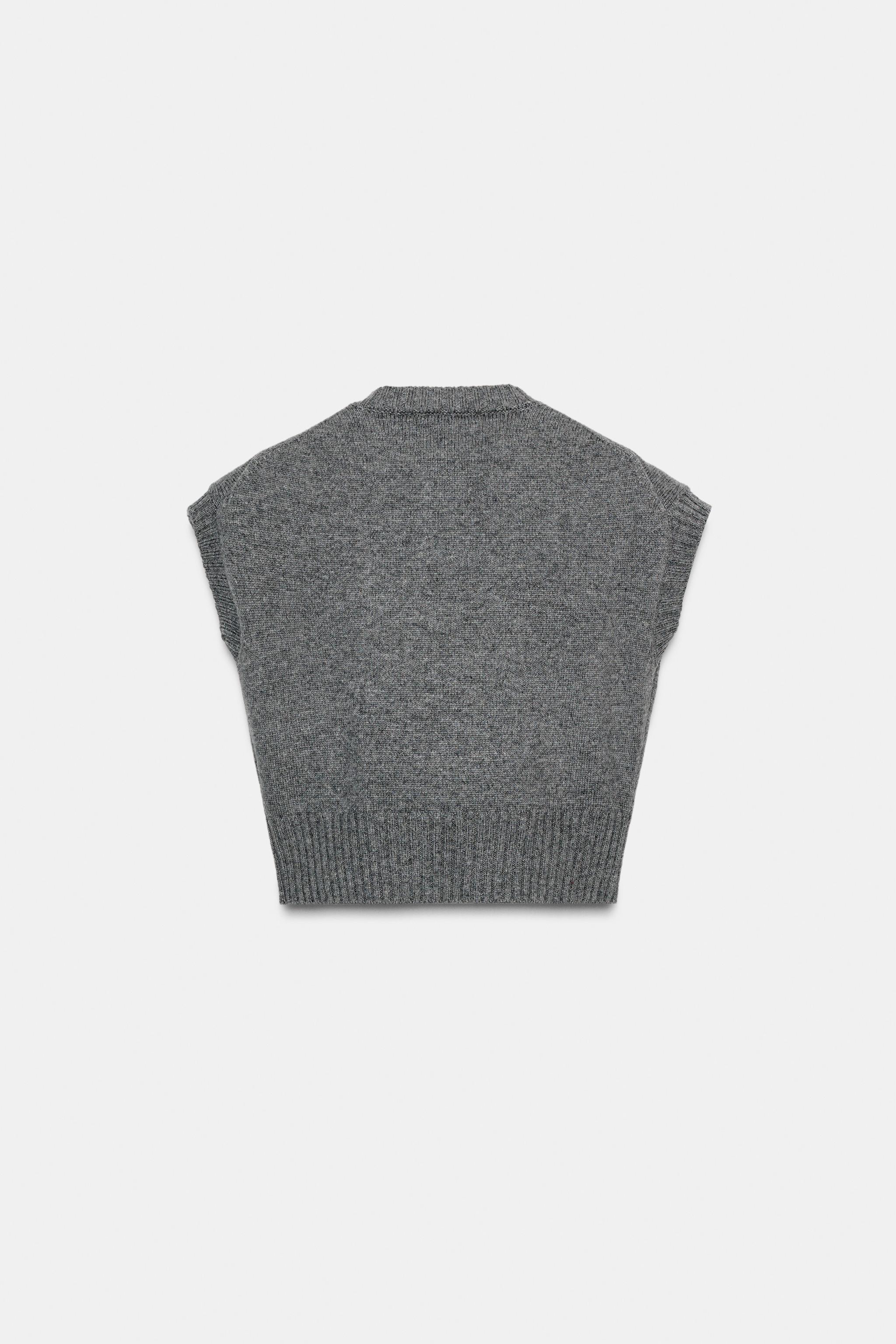 GILET EN MAILLE À BOUTONS REVÊTUS