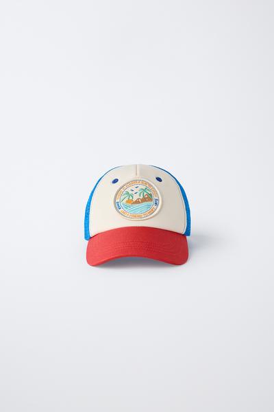 CASQUETTE À PIÈCE ET RÉSILLE