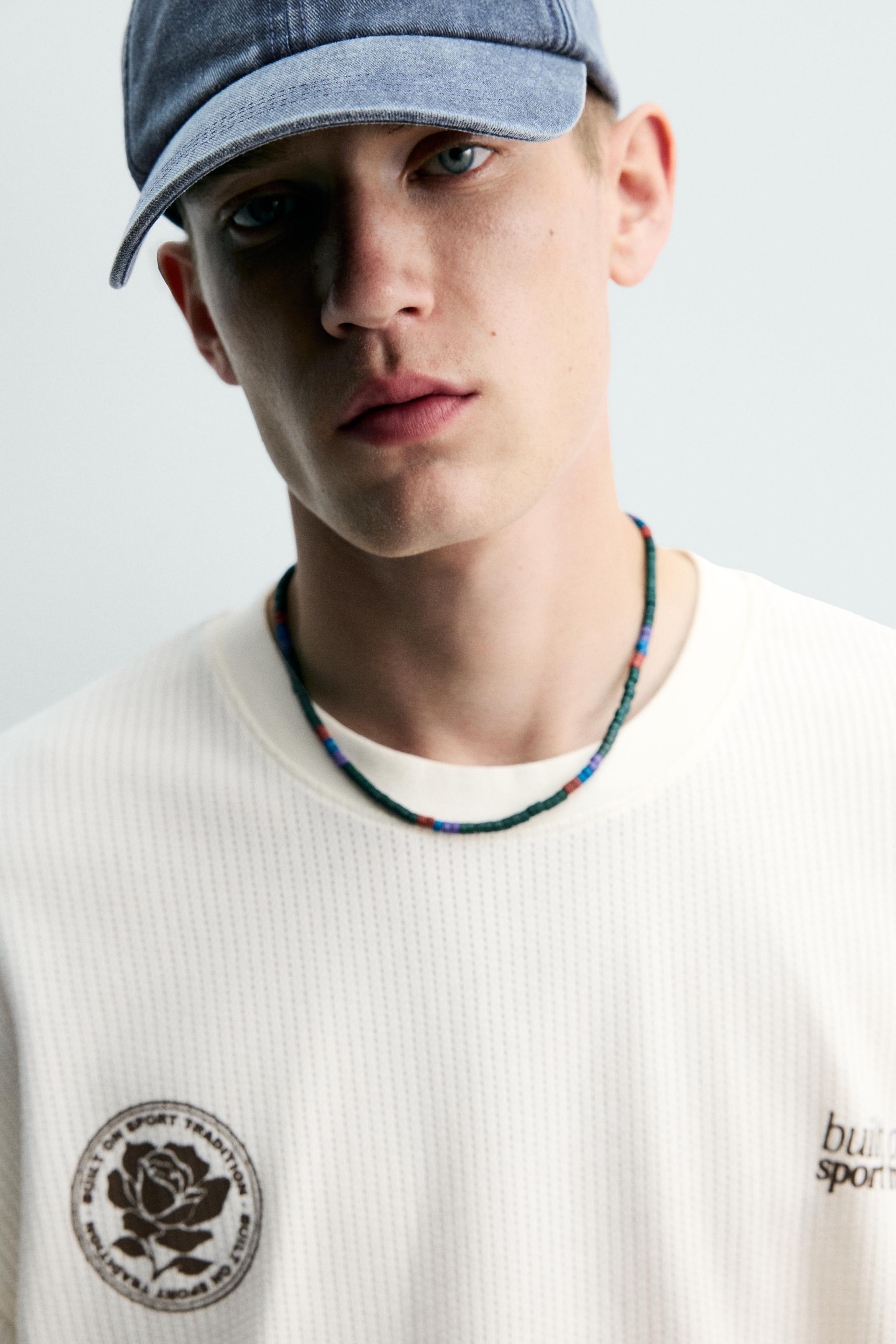 CONTRASTING PRINT TEXTURED T-SHIRT